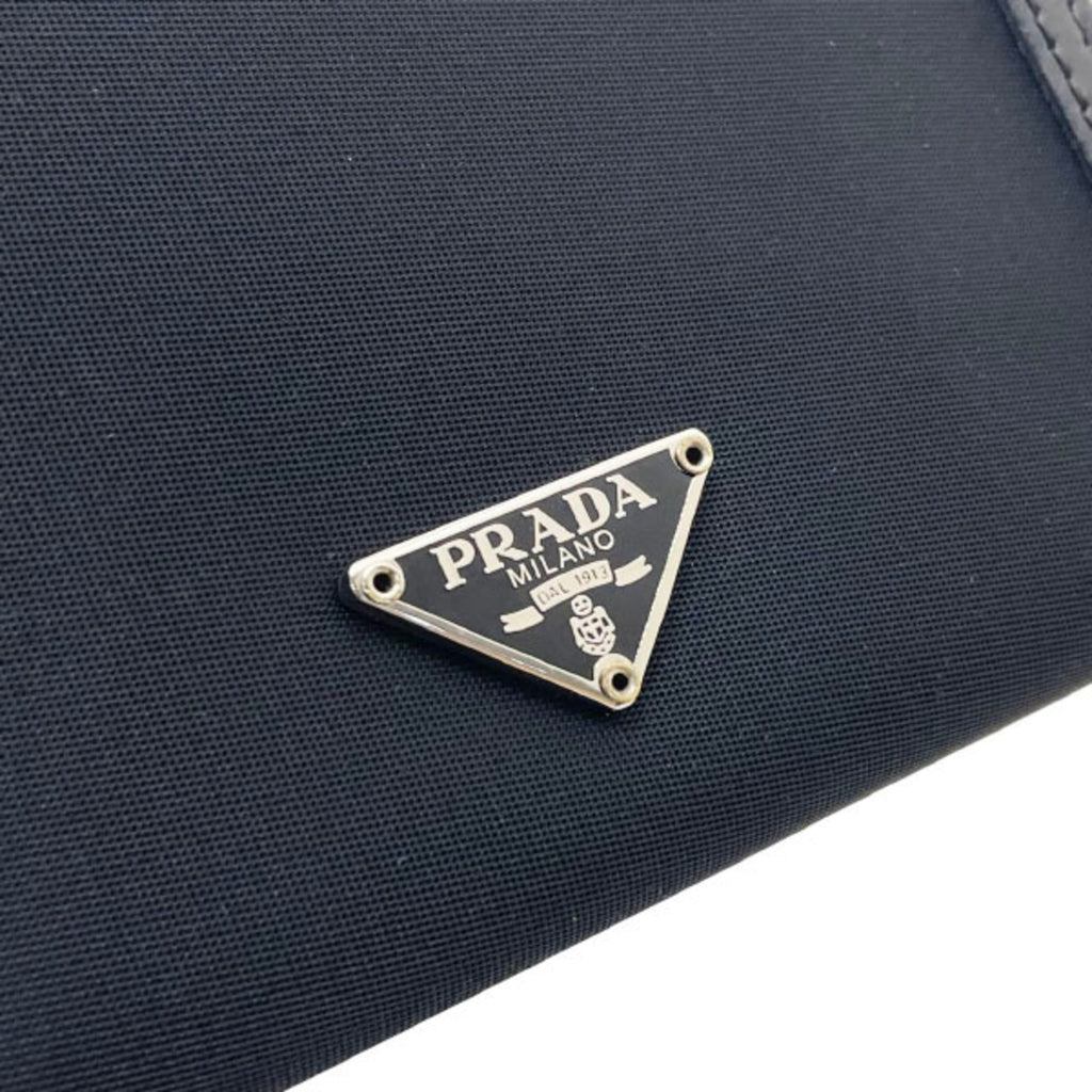 Prada Ribbon Triangle Trifold Wallet in Nylon and Leather, Black. Triangular Plate Compact Wallet, NERO MM-16119.