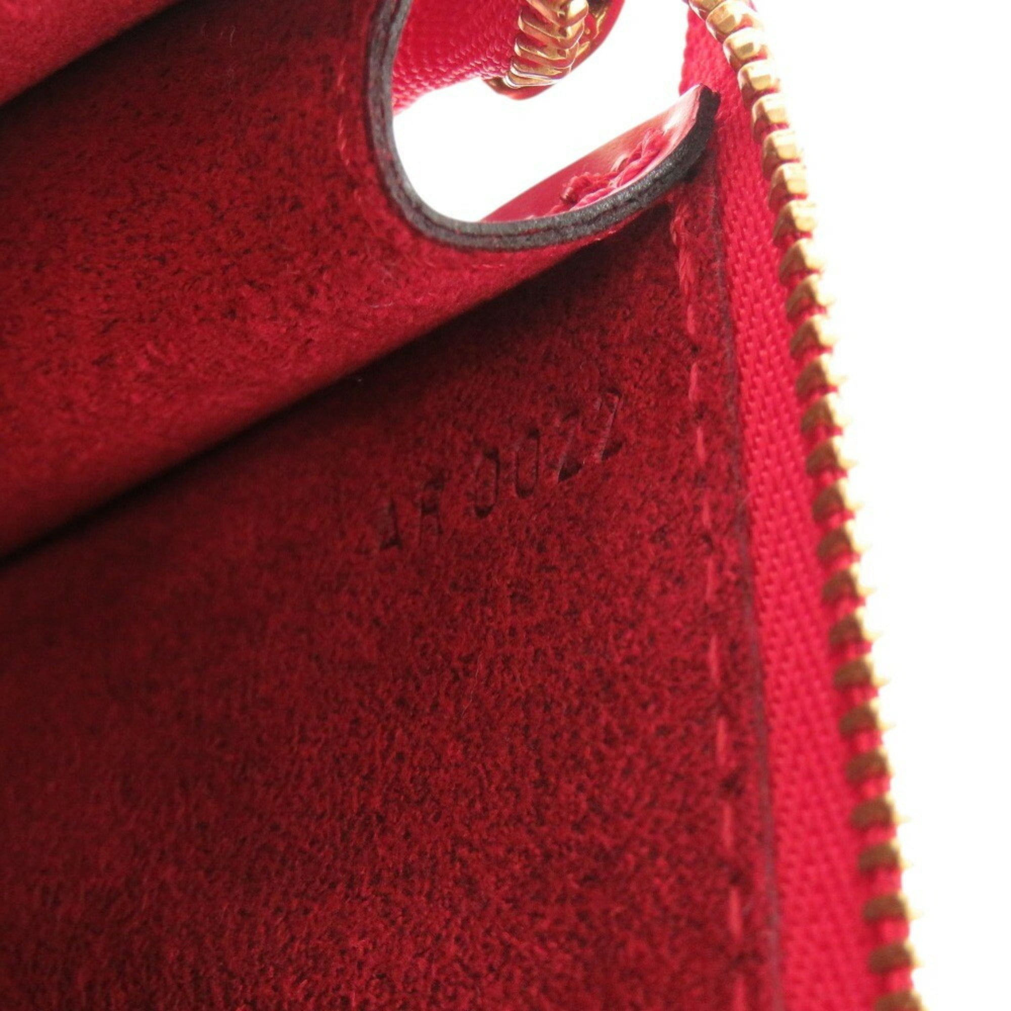 Like new Louis Vuitton Pochette Accessory Pouch Epi M52947 Castilian Red LV 0457LOUIS VUITTON — Like New