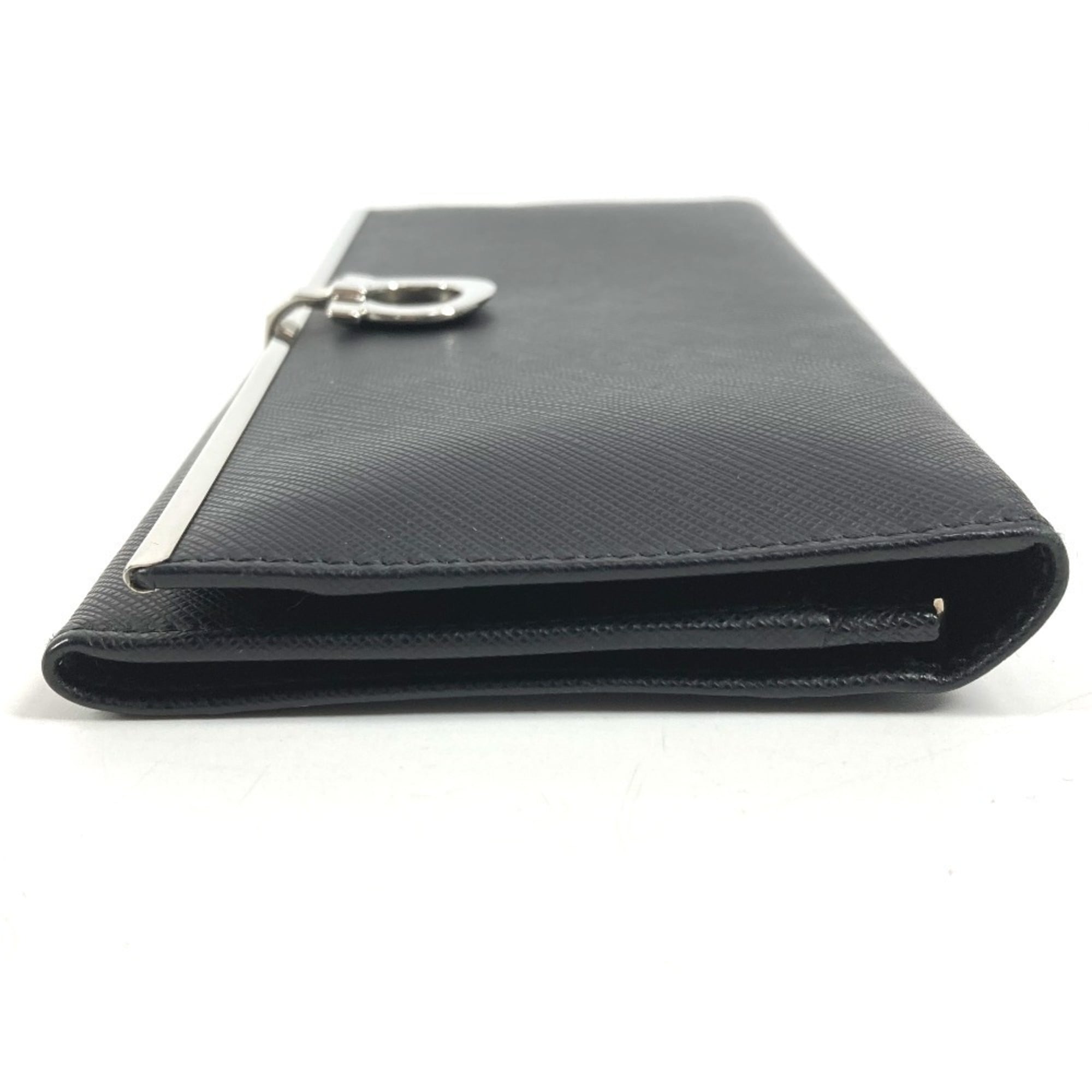 Salvatore Ferragamo Gancini logo long wallet in leather, black for men and women.