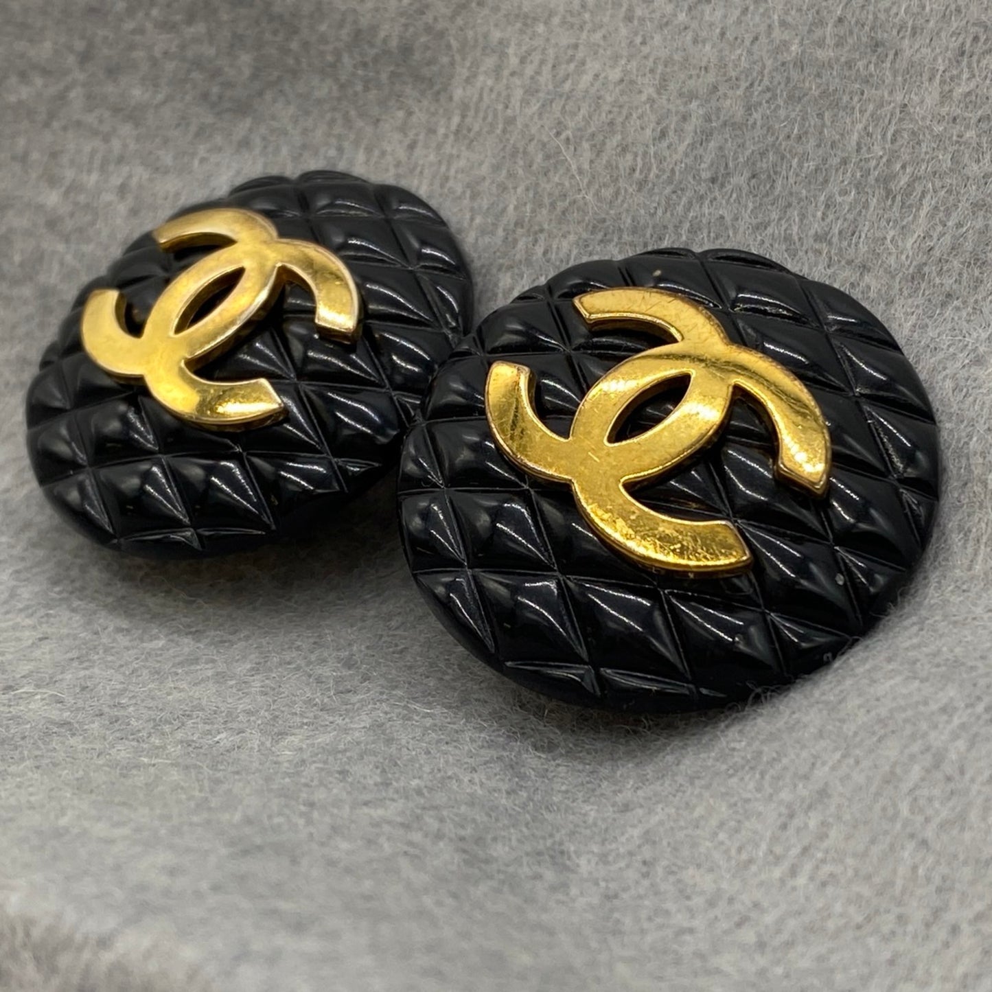 CHANEL Matelasse Coco Mark Earrings in Black and Gold