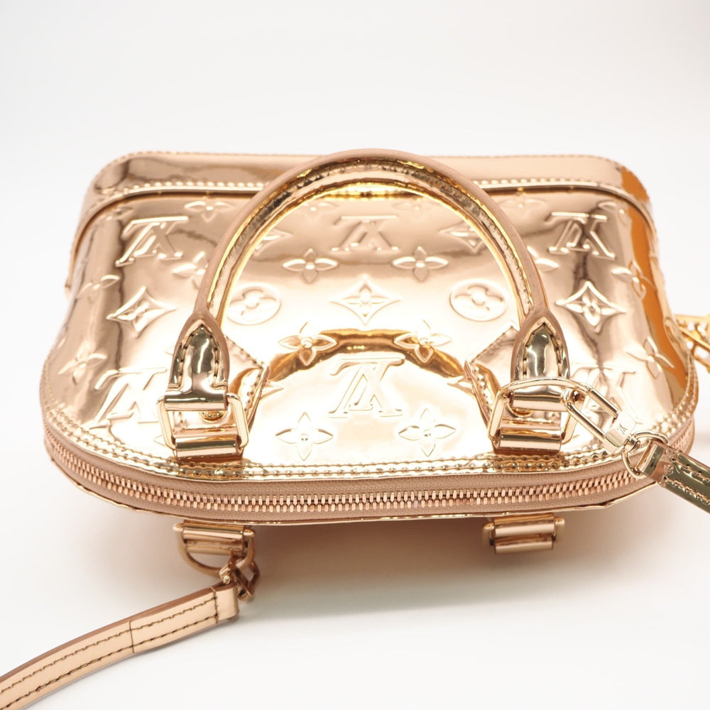 LOUIS VUITTON Monogram Alma BB Cuivre M27037 Handbag Bronze Coated Canvas Women's — New - Store Return