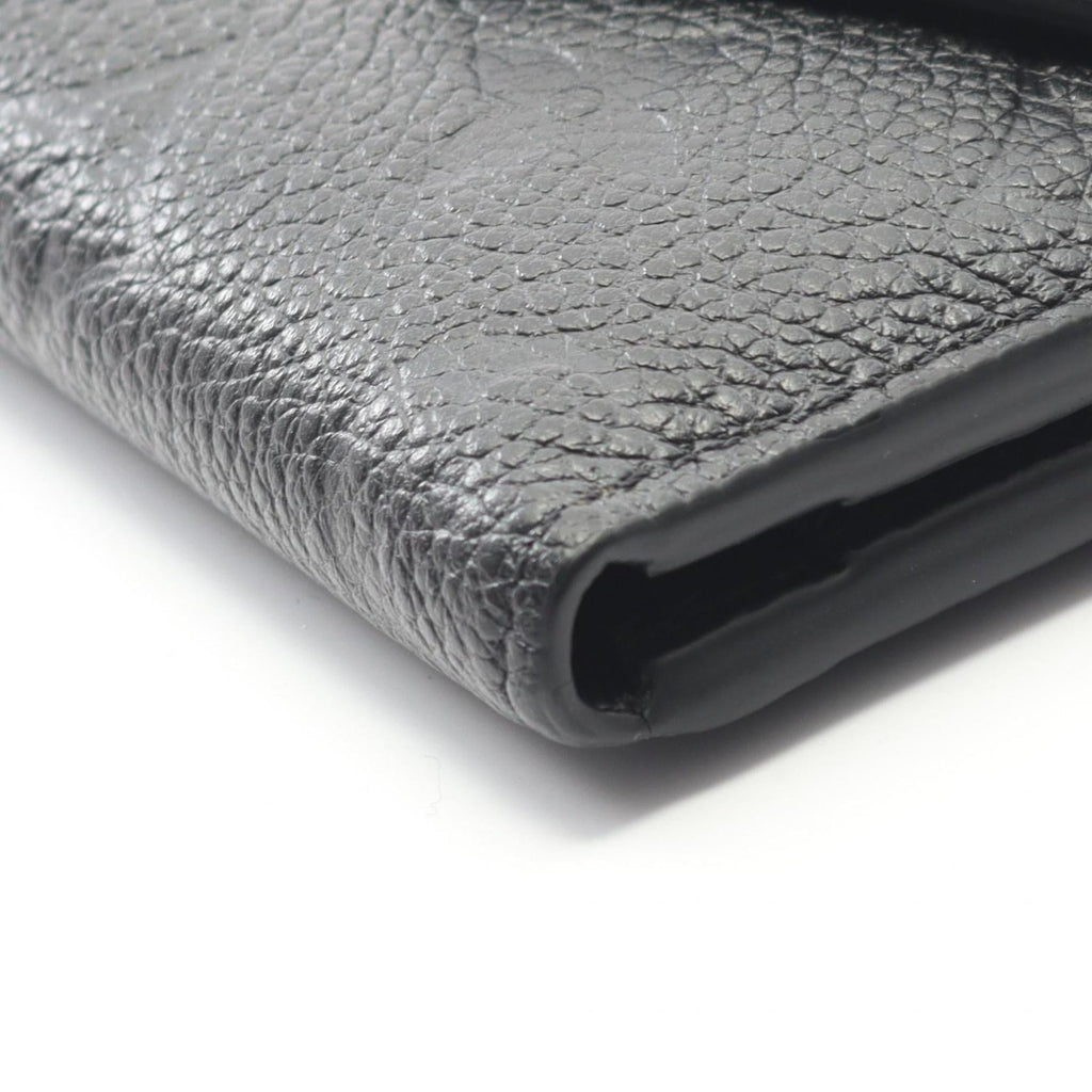 Louis Vuitton Portefeuille Zoe Tri-fold Wallet in Monogram Empreinte Leather, Women's, Black, M62935