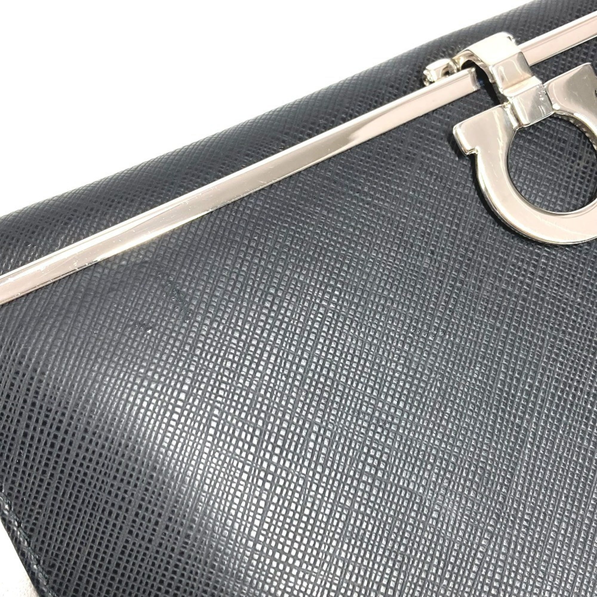 Salvatore Ferragamo Gancini logo long wallet in leather, black for men and women.
