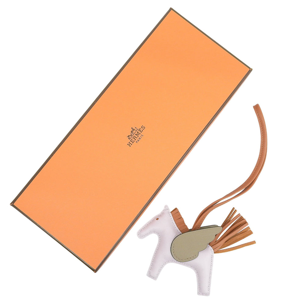HERMES Rodeo Pegasus PM bag charm in Agneau Milo mauve pale beige Malfa Pain d'Épices with W stamp, box included, made France, women's — Like New