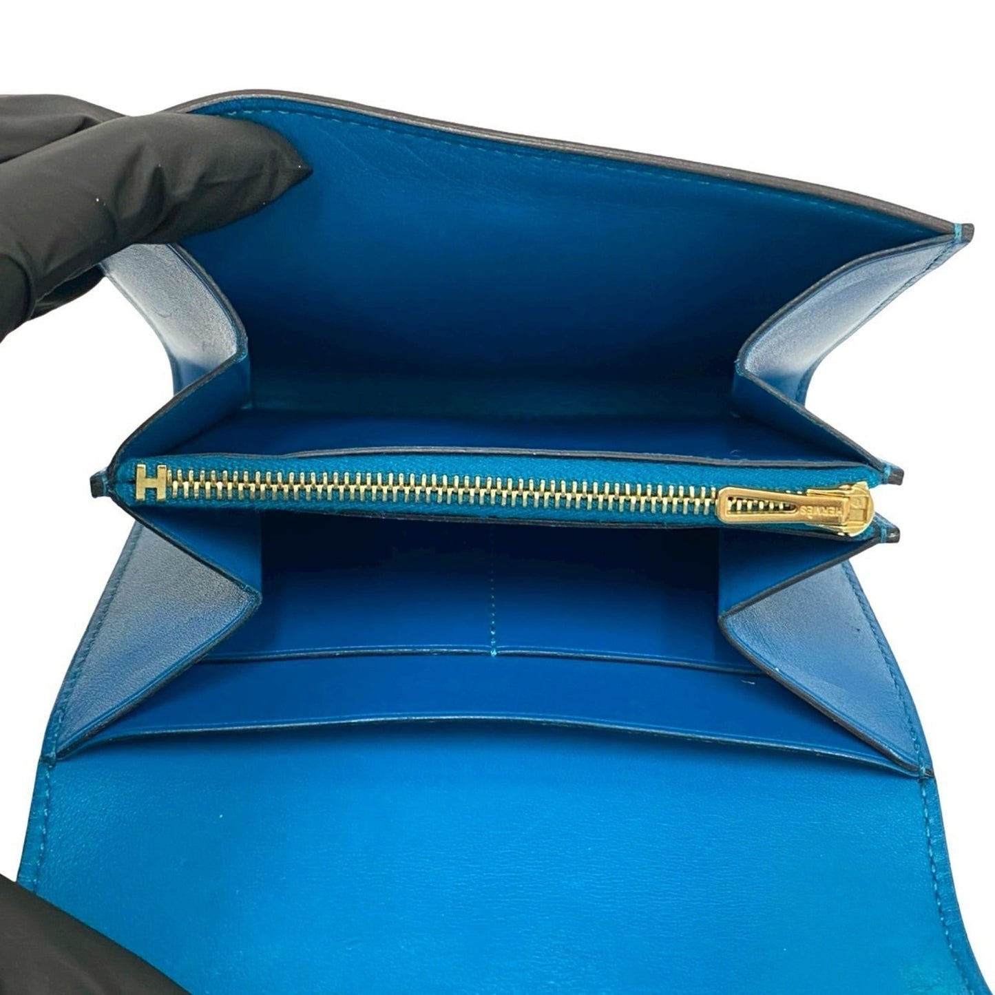 A stamped HERMES Constance Compact Calf Leather Bi-fold Wallet Blue 28793