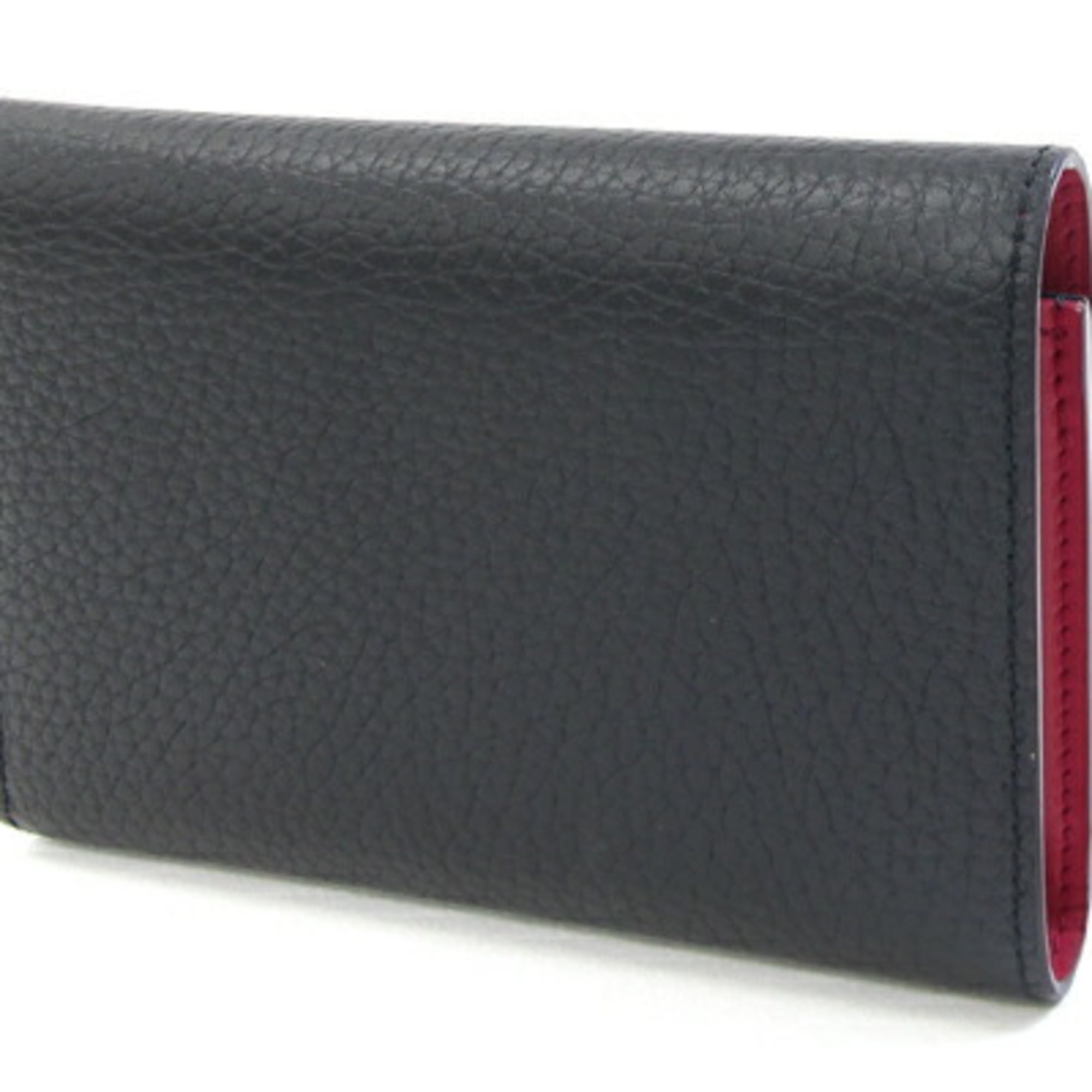 Louis Vuitton Portefeuille Capucines Compact Tri-fold Wallet M62157 in Noir and Hot Pink Taurillon Leather. LV Wallet, Two-Tone Design. Women's. LOUIS VUITTON