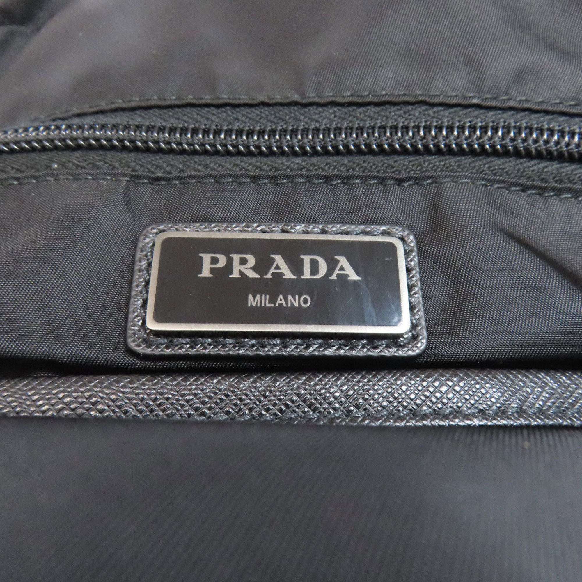 Prada logo hardware body bag nylon material women's