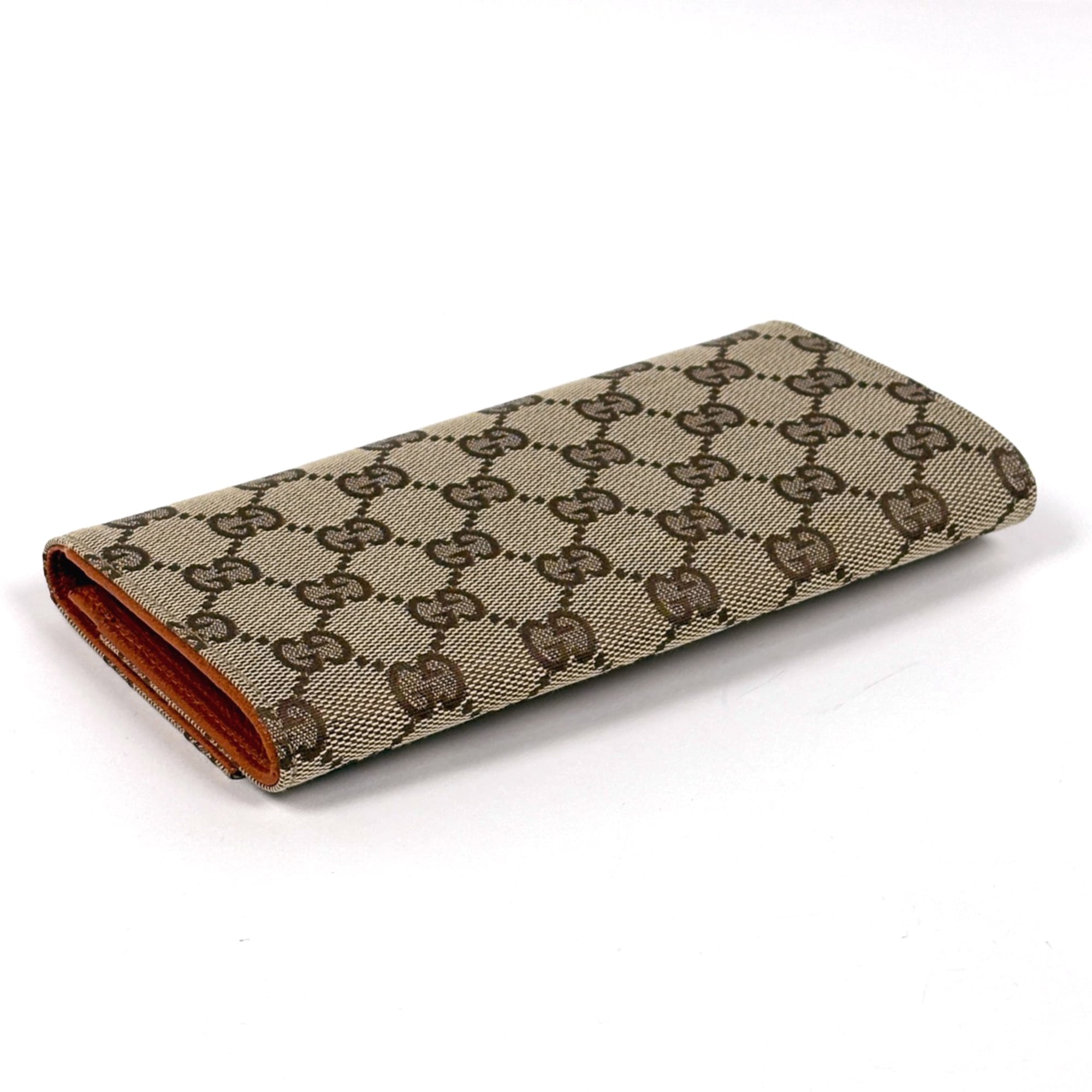 Gucci GG-patterned long wallet with bill compartment and coin purse in brown GG canvas (120967) for women