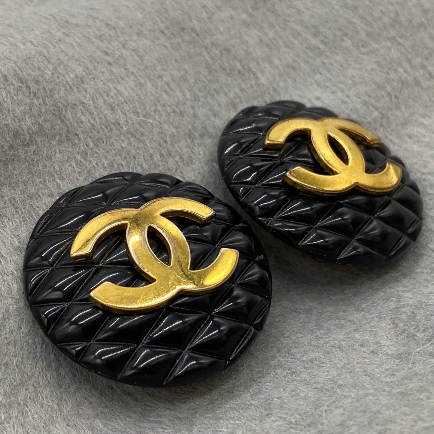 CHANEL Matelasse Coco Mark Earrings in Black and Gold
