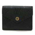 LOUIS VUITTON Monogram Empreinte Portefeuille Zoe Tri-fold Wallet in Black (Noir) M62935