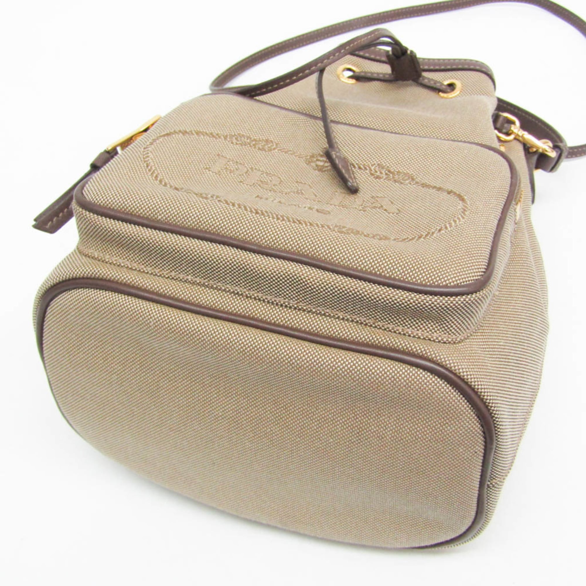 Prada Logo Jacquard Drawstring Bag Women's Leather,Jacquard Handbag,Shoulder Bag Beige Brown,Dark Brown — Like New
