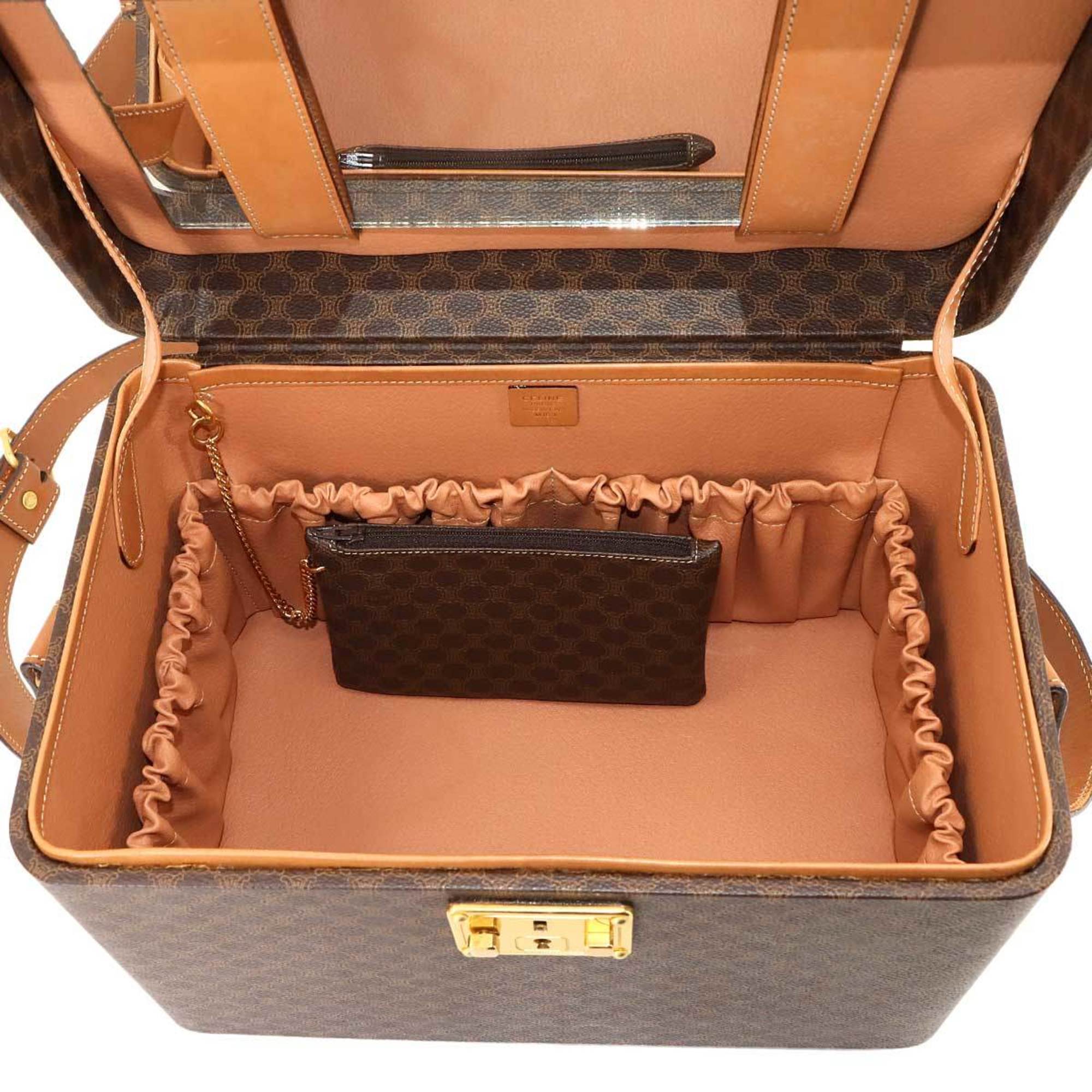 Celine Macadam Vanity 2-way hand/shoulder bag in brown PVC leather with gold hardware.