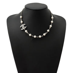 Chanel necklace with Coco Mark, faux pearl and rhinestone design. CHANEL for women — Like New