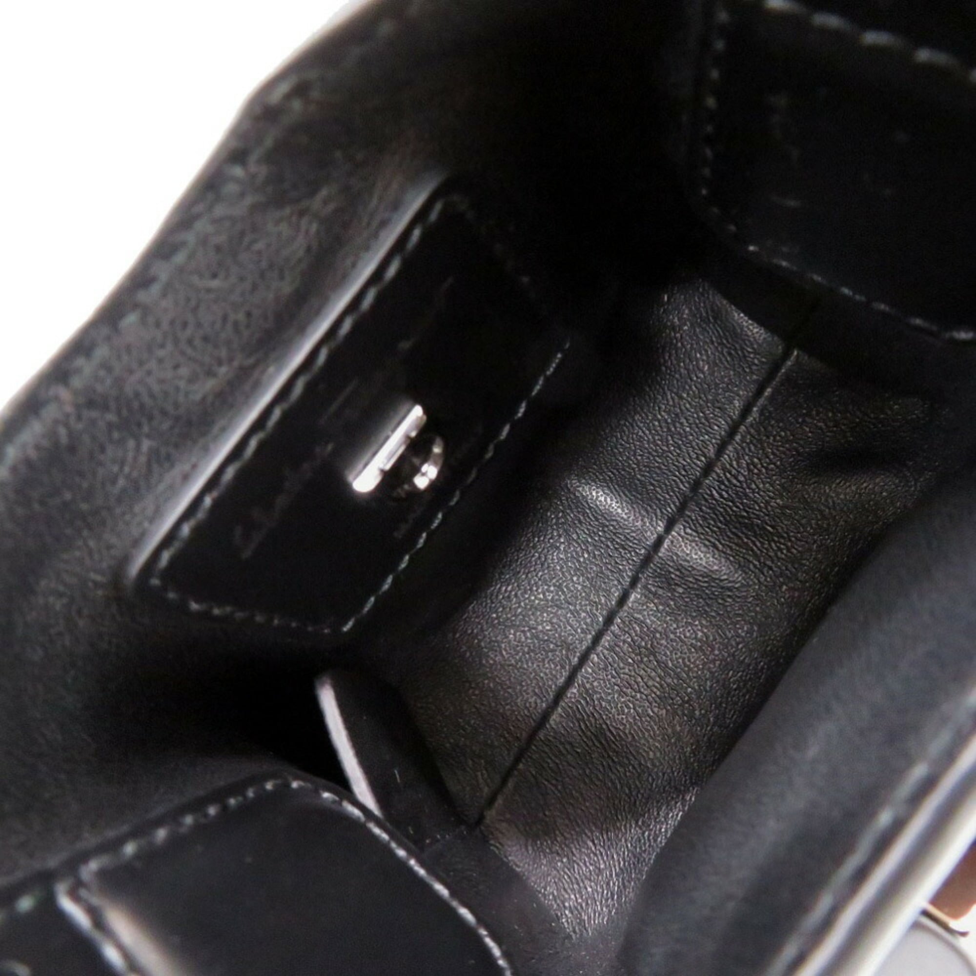 Like new Salvatore Ferragamo Gancini Trifoglio leather black handbag, model 0903 — Like New