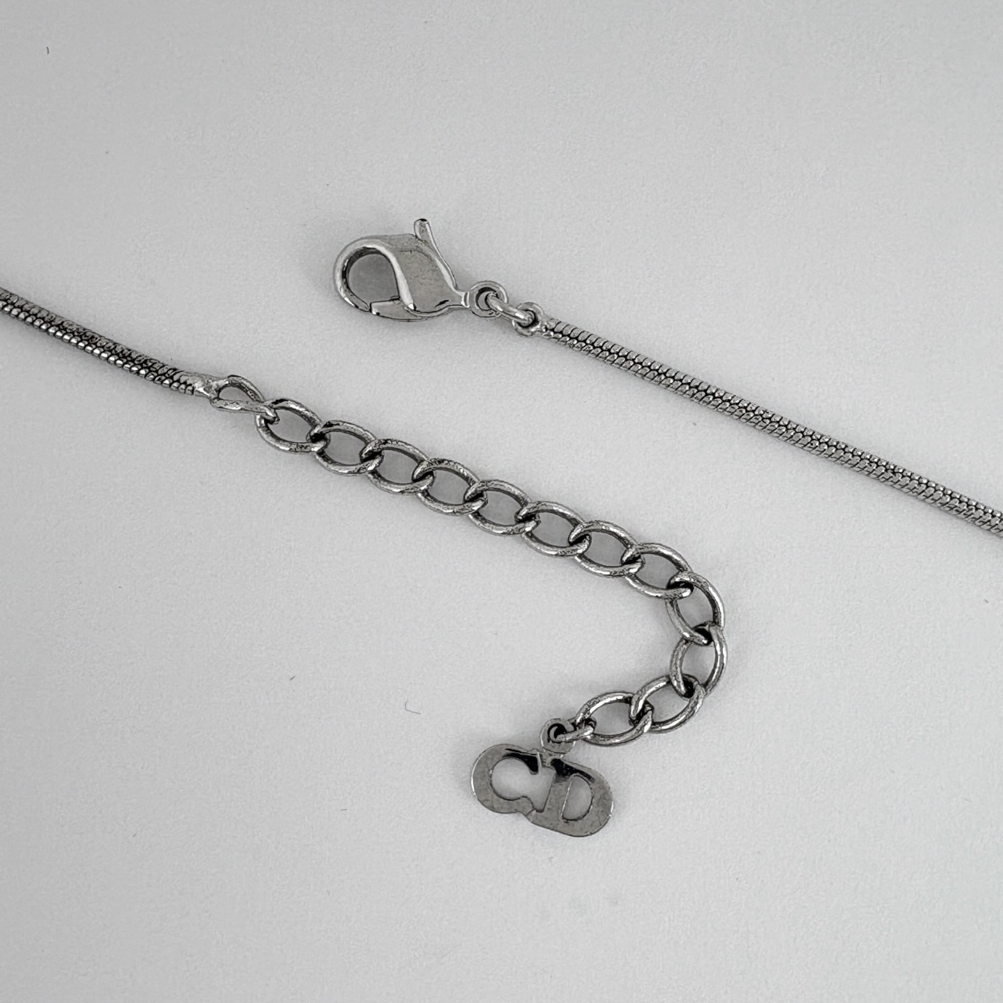 Christian Dior D logo rhinestone necklace, silver plated, for women.