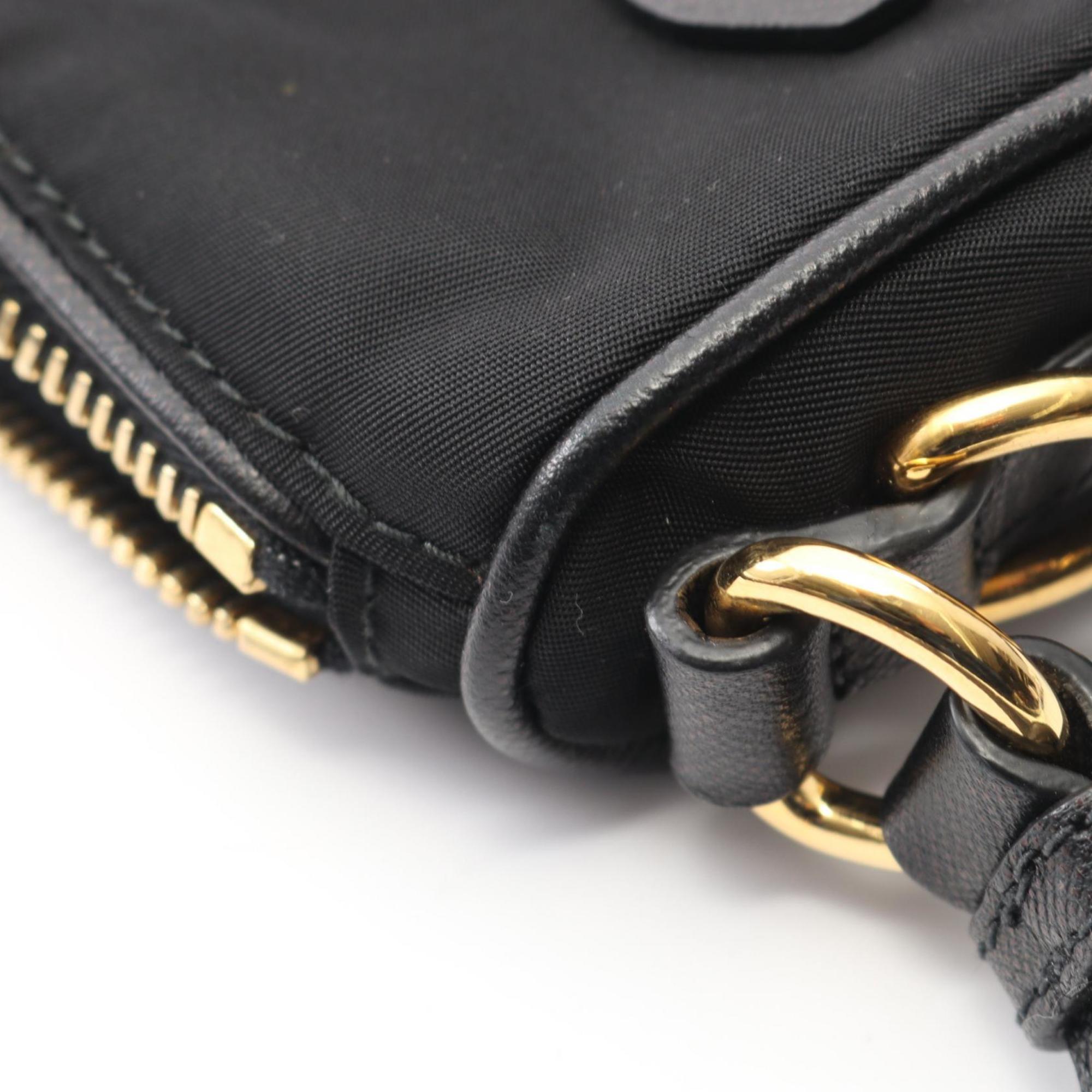 Prada handbag in nylon and Saffiano leather, black for women