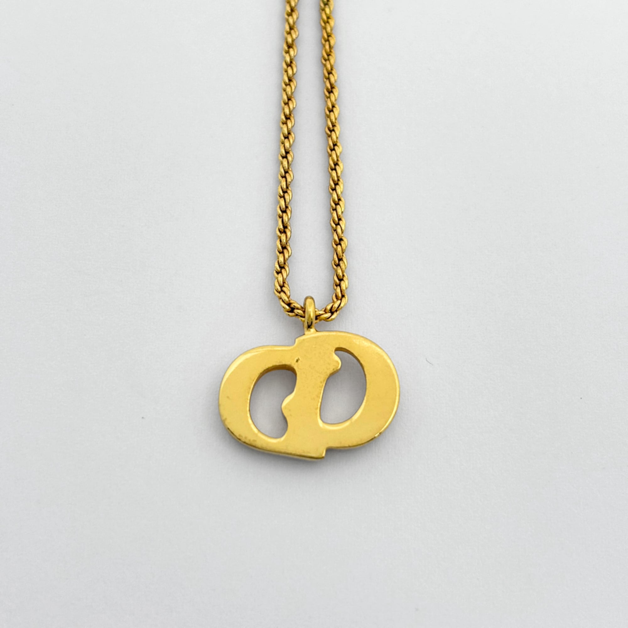 Christian Dior logo necklace CD GP gold for women