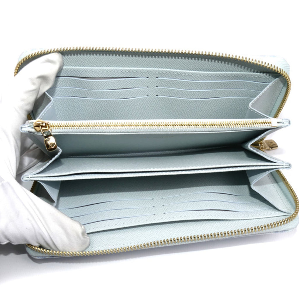 LOUIS VUITTON Louis Vuitton Zippy Wallet Long Monogram Origin Blue Courier M27686 Men's and Women's
