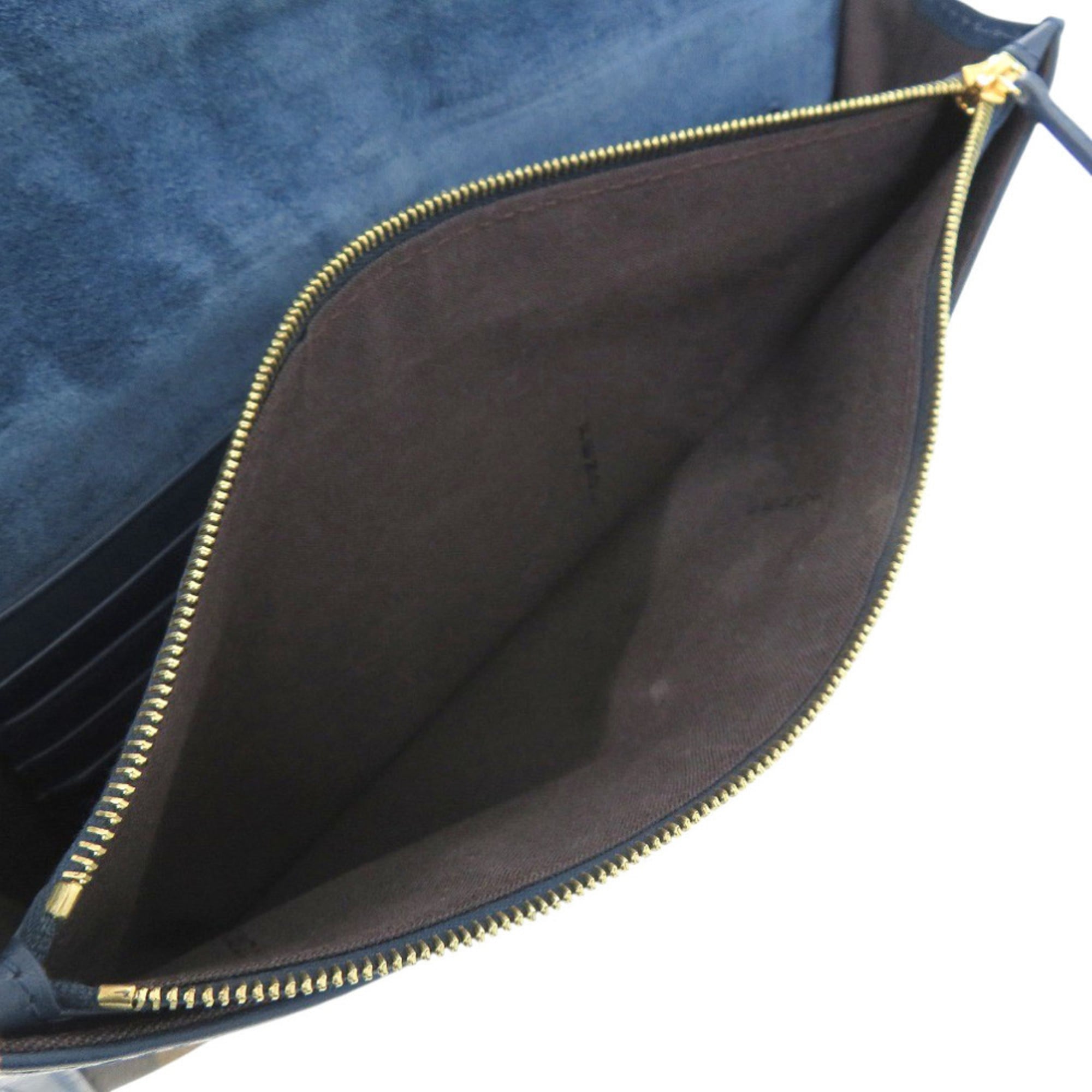 Excellent condition Fendi Pecan pattern clutch bag 8M0284 in leather and canvas, blue brown. 0475FENDI