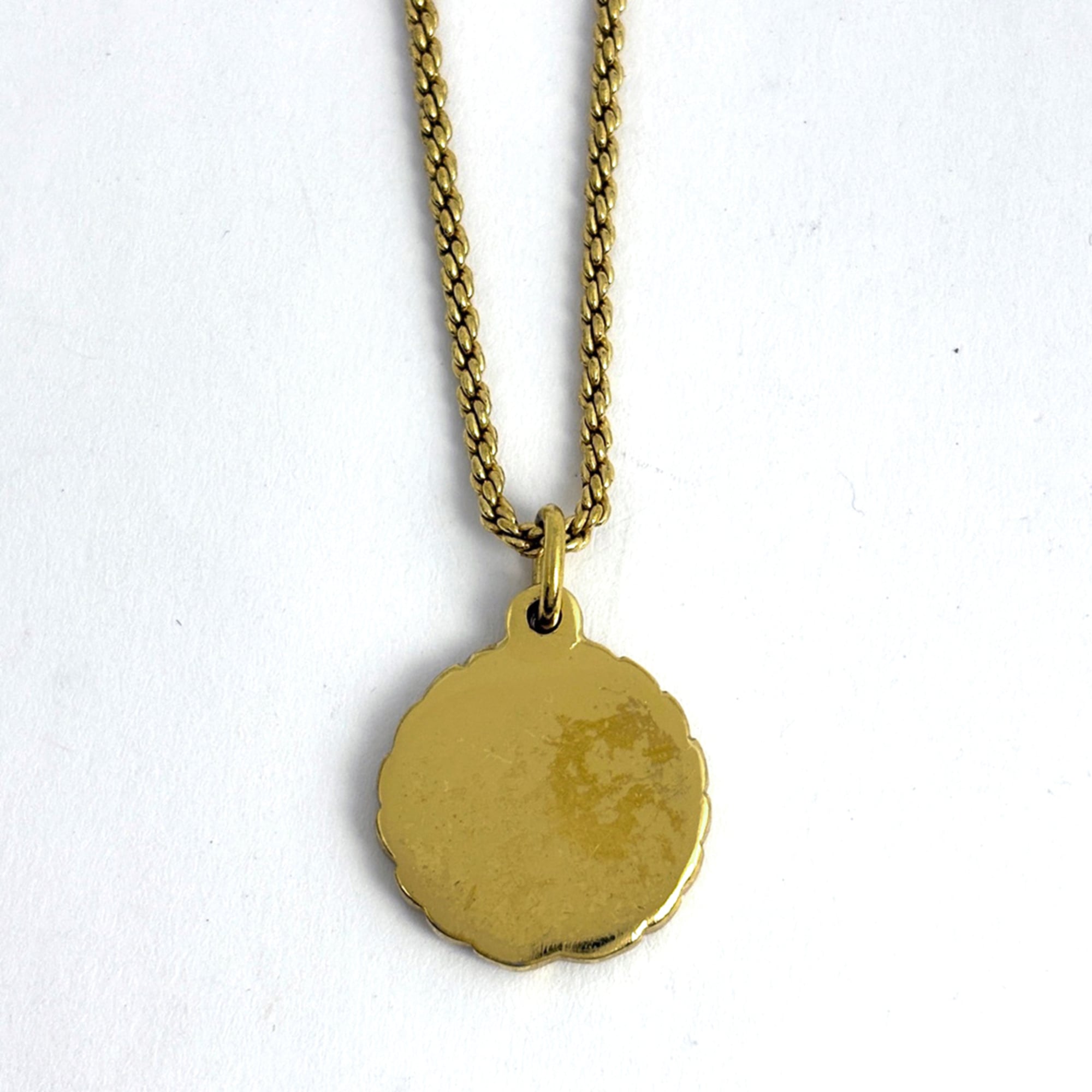 Christian Dior logo round necklace in GP gold for women.
