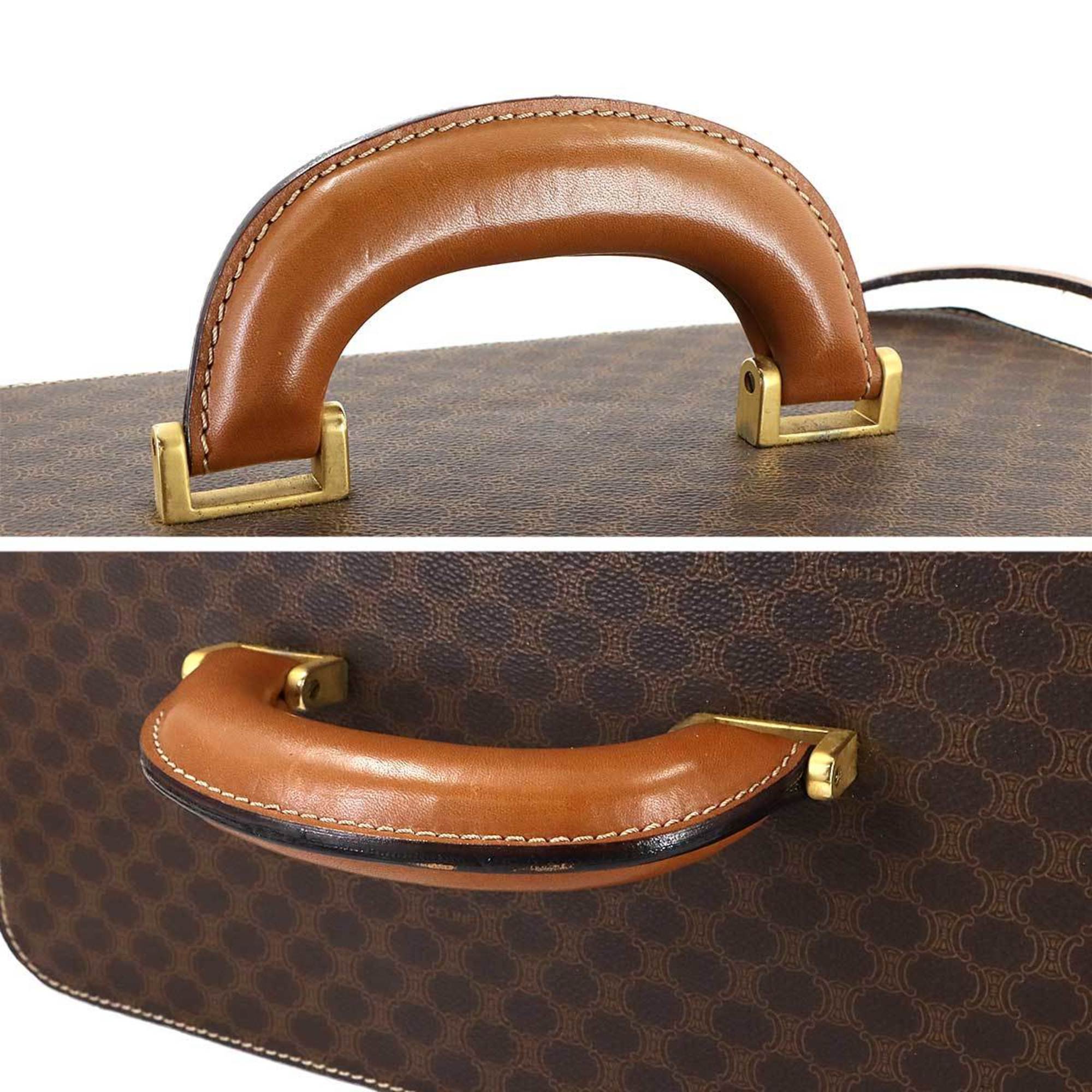 Celine Macadam Vanity 2-way hand/shoulder bag in brown PVC leather with gold hardware.