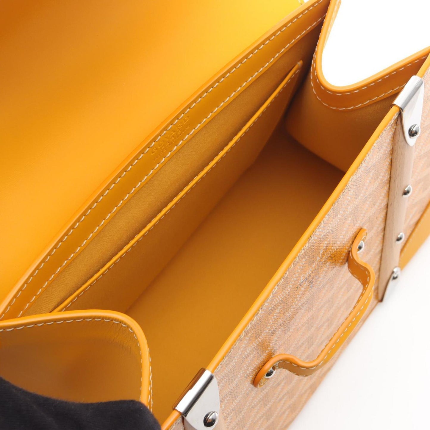 Goyard Saigon PM handbag in coated canvas and leather, available multicolored yellow.