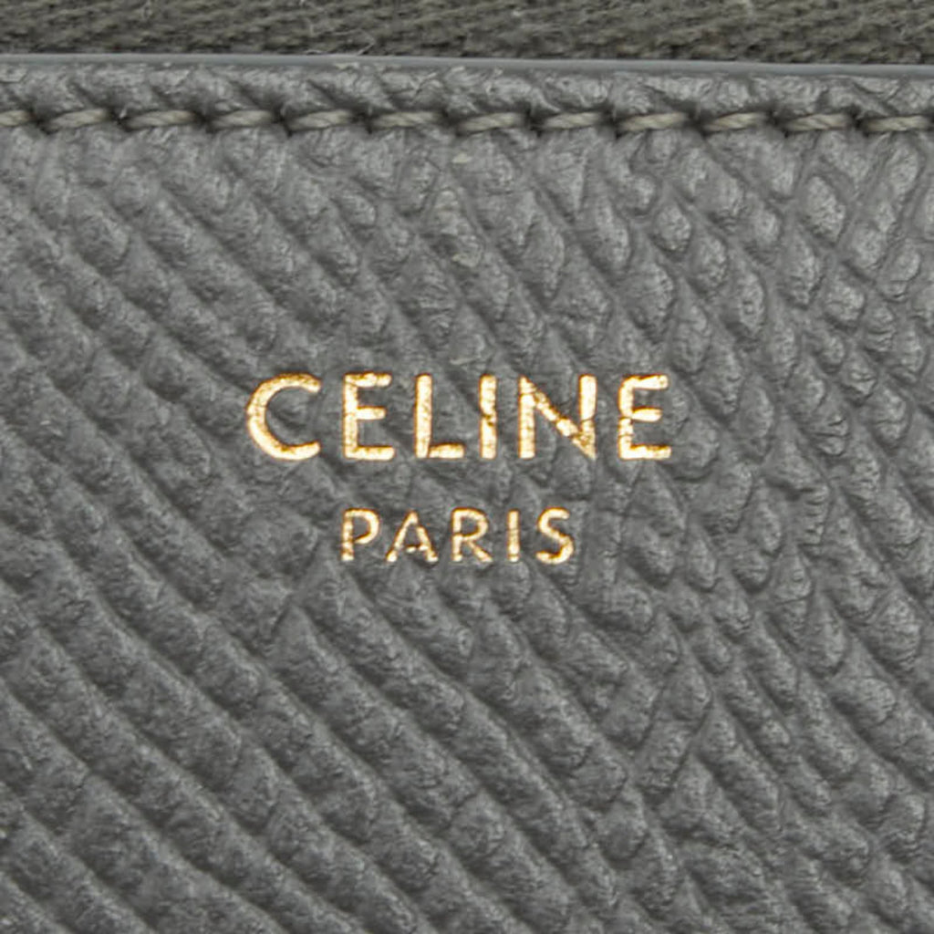 Celine round zipper long wallet in gray leather for women.