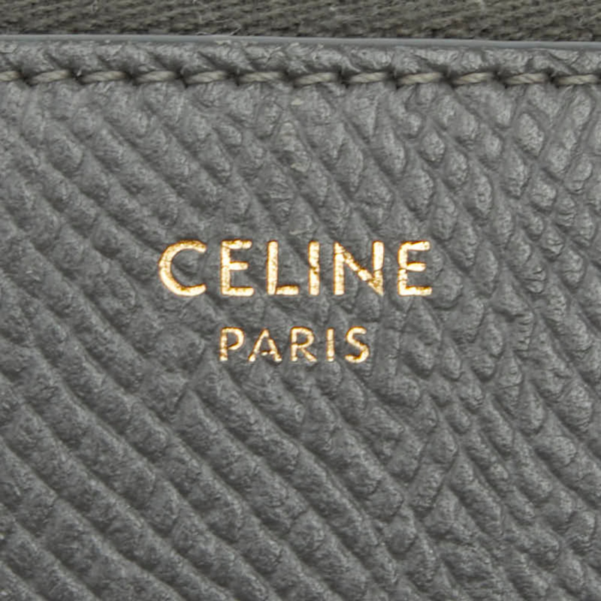Celine round zipper long wallet in gray leather for women.