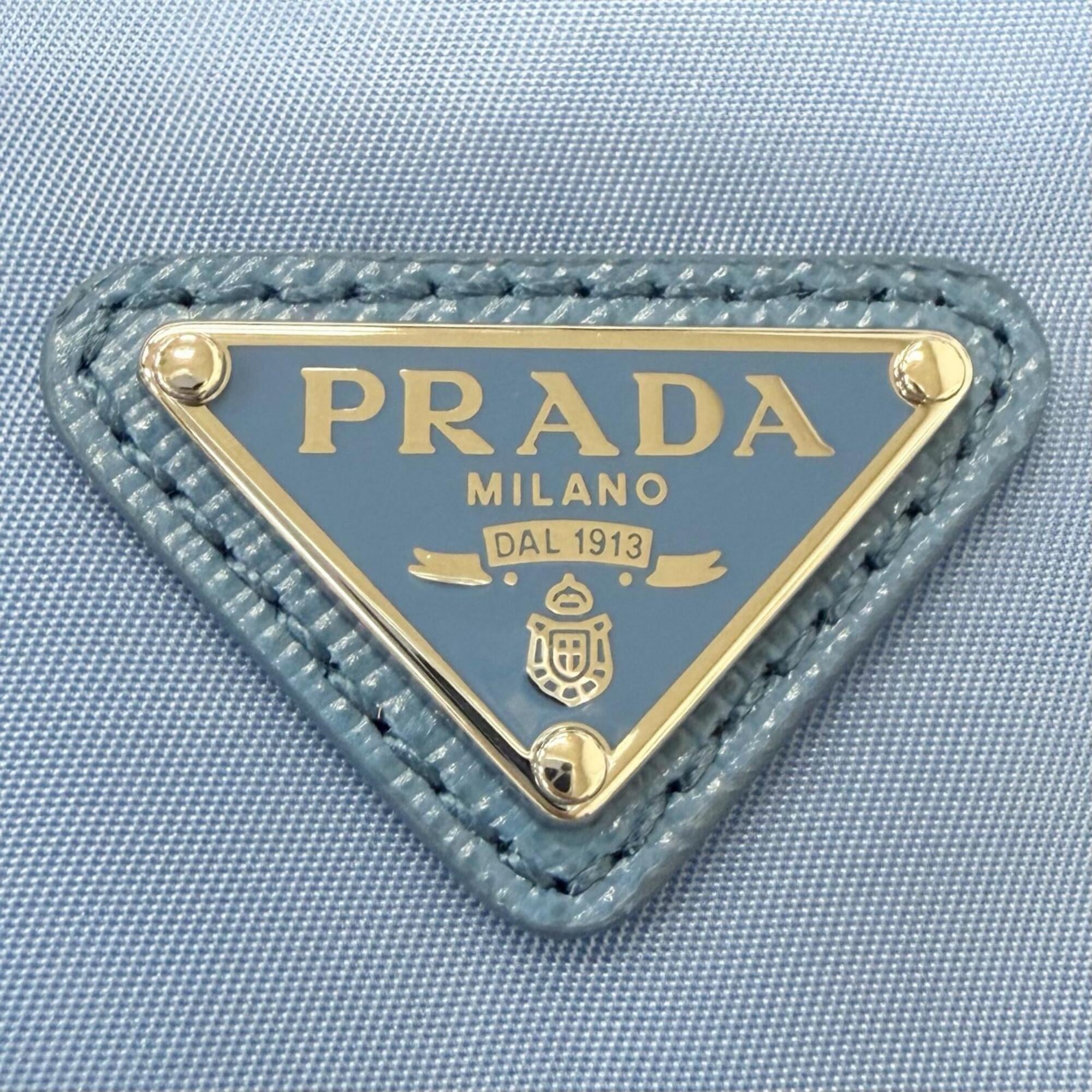 PRADA 1NS369 Recycled Polyamide Triangle Logo Partial Leather Re-Nylon Drawstring Bag Handbag Light Blue Made in Italy Men's — Like New