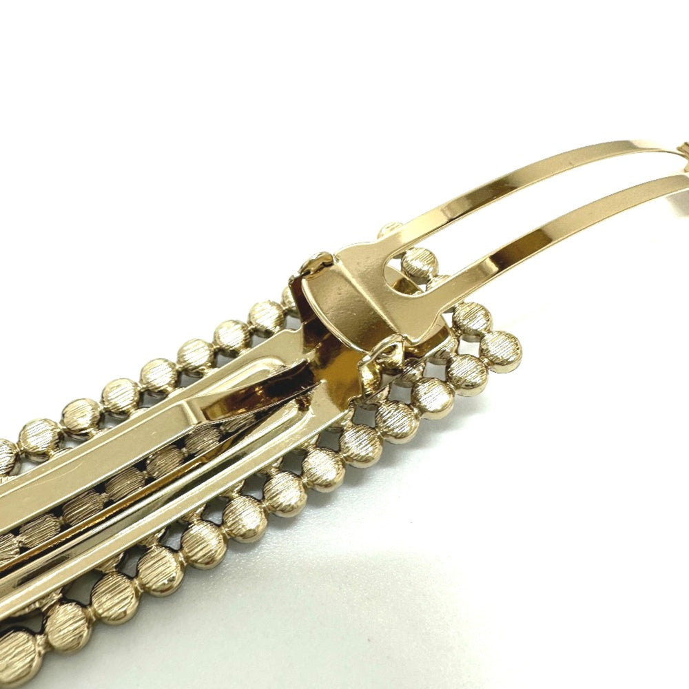 Chanel logo hair accessory Valletta Gold — Like New