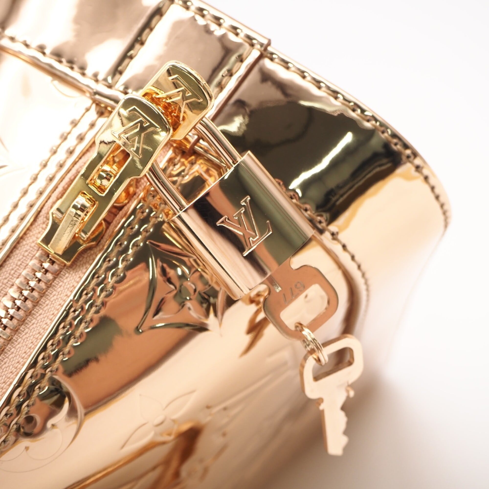 LOUIS VUITTON Monogram Alma BB Cuivre M27037 Handbag Bronze Coated Canvas Women's — New - Store Return