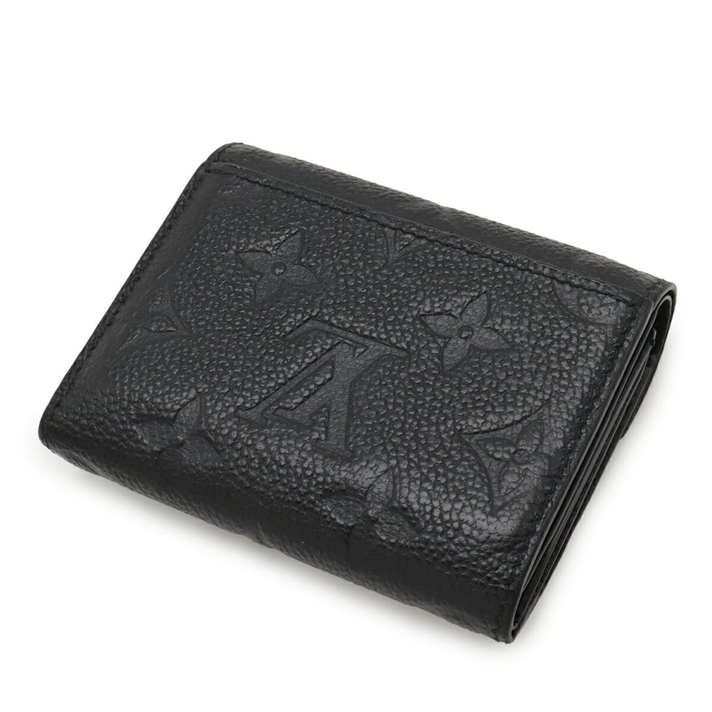 LOUIS VUITTON Monogram Empreinte Portefeuille Zoe Tri-fold Wallet in Black (Noir) M62935