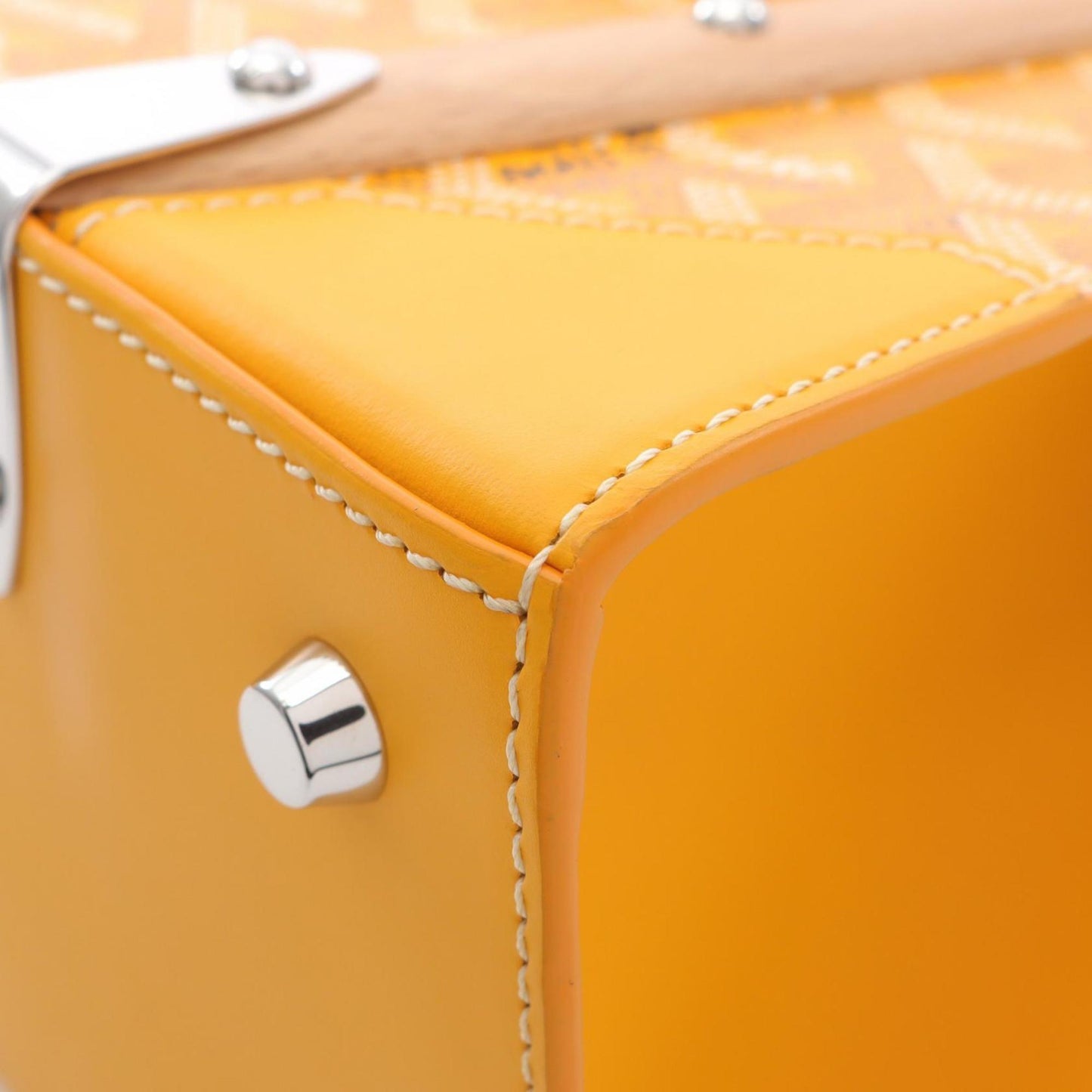 Goyard Saigon PM handbag in coated canvas and leather, available multicolored yellow.