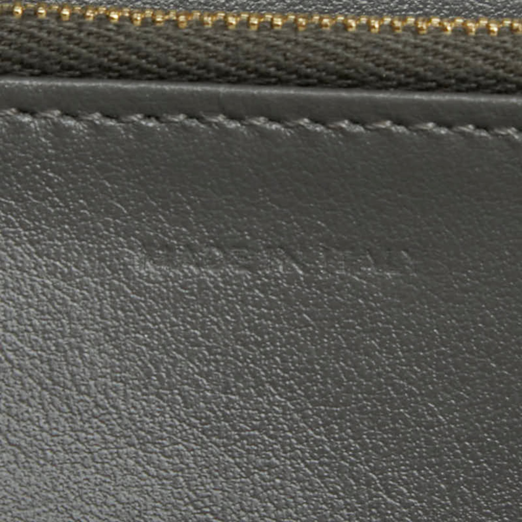 Celine round zipper long wallet in gray leather for women.