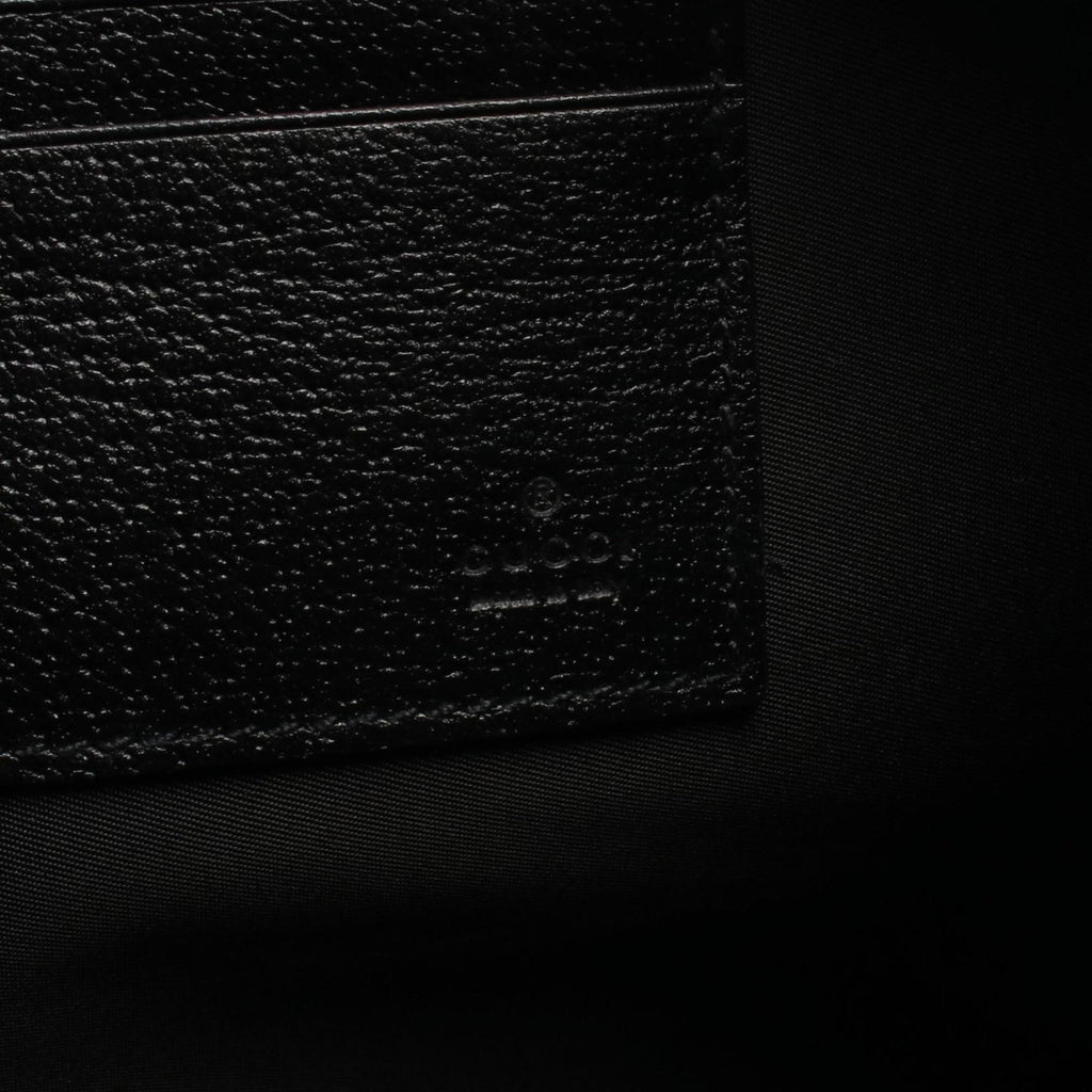 Gucci Off the Grid GG pattern clutch bag in leather and nylon canvas, black, 625598