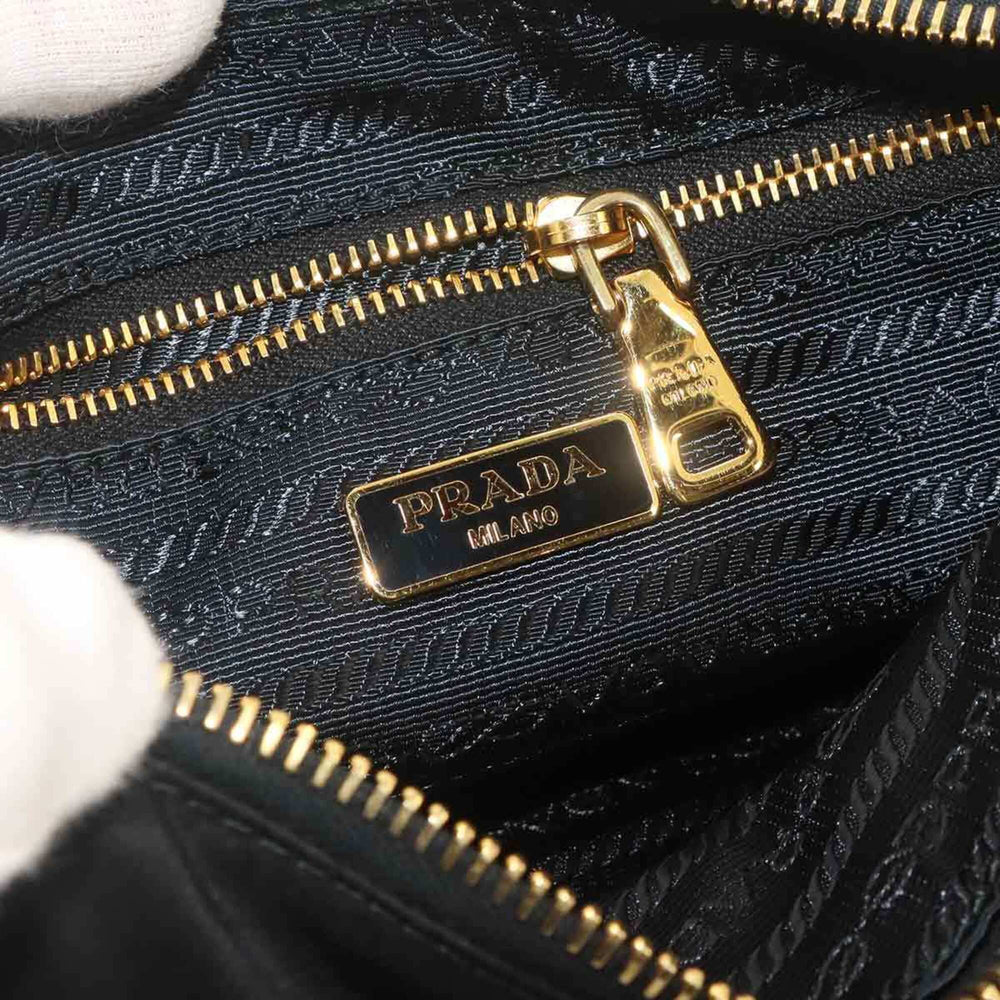 Prada handbag/pouch, nylon, Saffiano leather, black, gold hardware — Like New