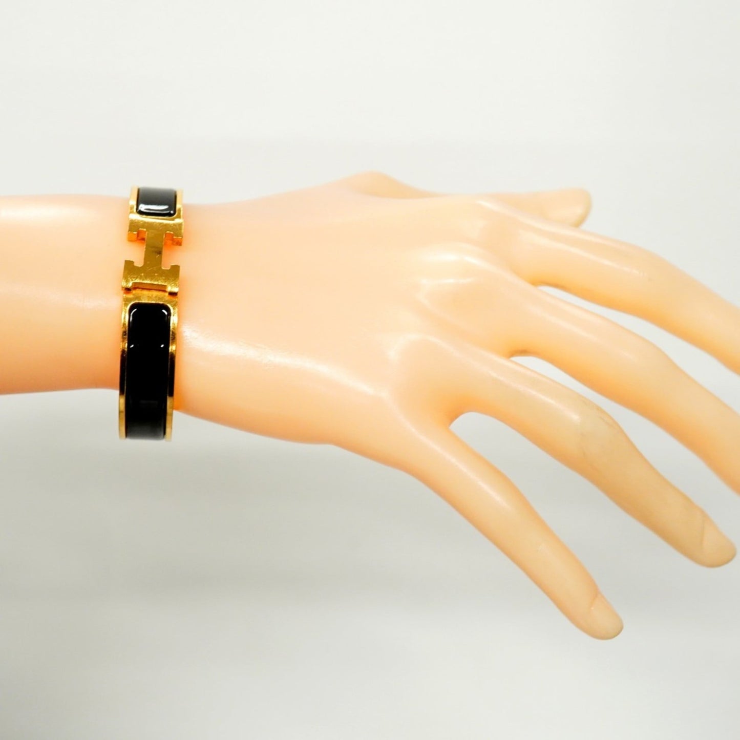 Hermes Click-Clack PM Bangle in GP-plated Gold and Black for Women