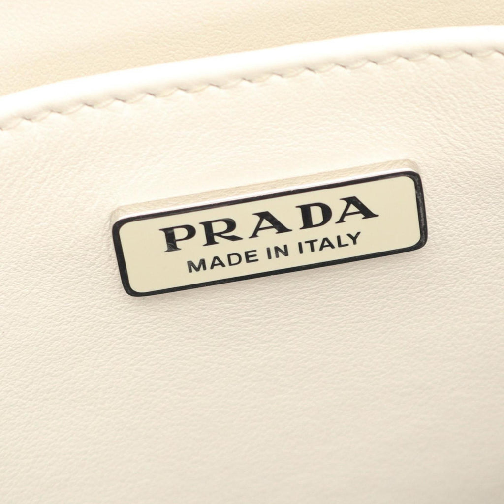 Prada embossed logo handbag, leather, women's, white, 1BA333
