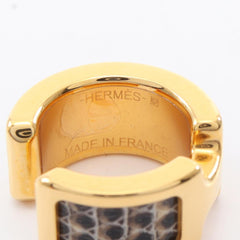 Hermes Olympe PM accessory, gold-plated leather, women's, gold and black tones — New - Store Return