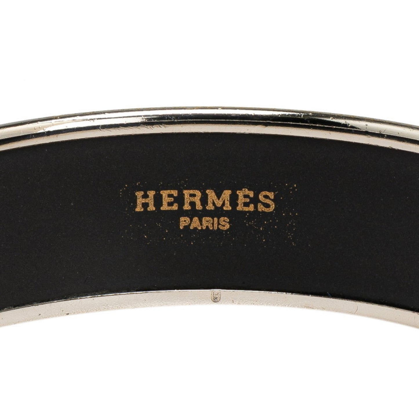 Hermes enamel horse, Pegasus, and star motif bangle in silver, black, multicolored metal for women.