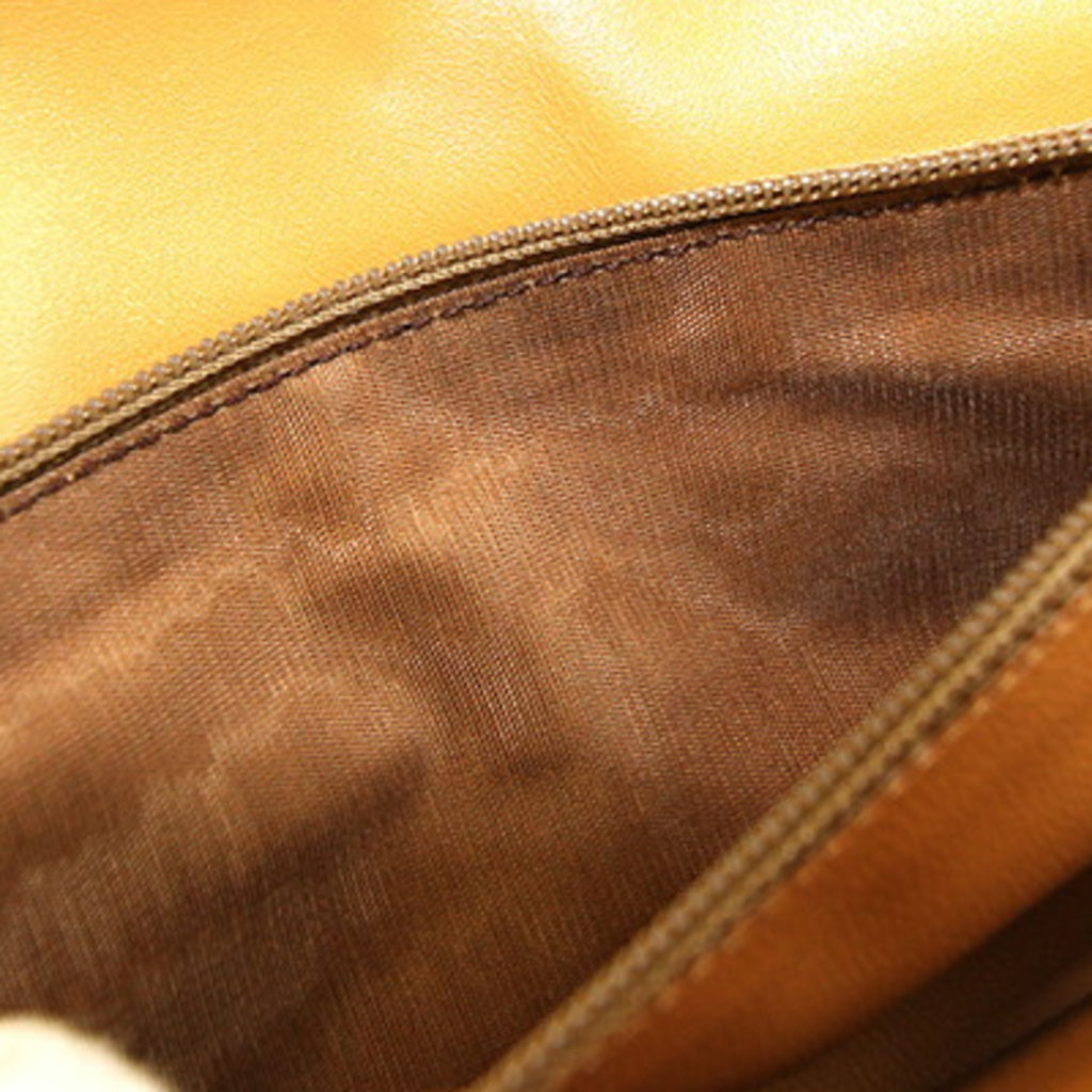 Celine bifold long wallet in macadam, dark brown, beige, PVC, and leather. Women's.