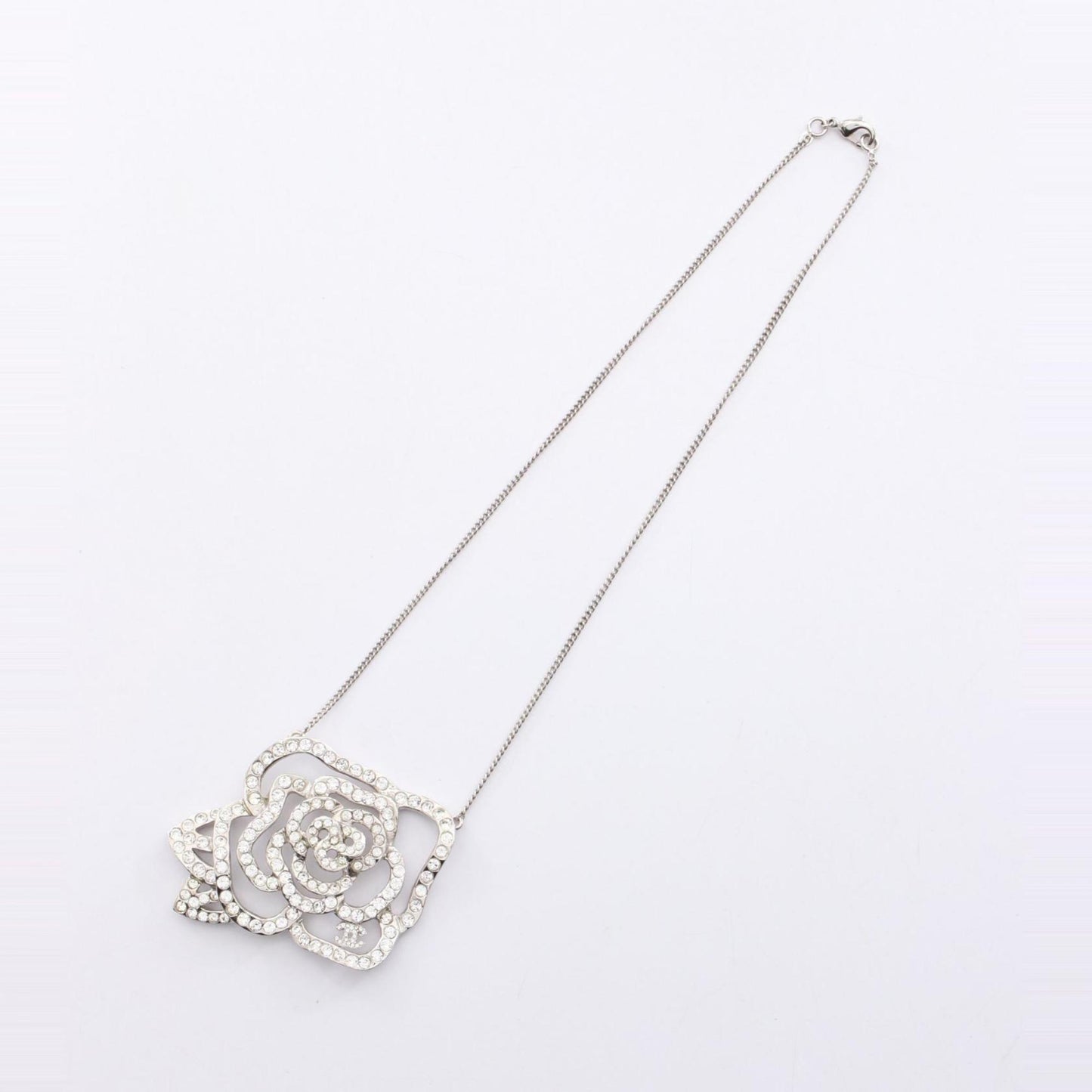 CHANEL Camellia Coco Mark Necklace in Stainless Steel with Rhinestones, Silver and Clear