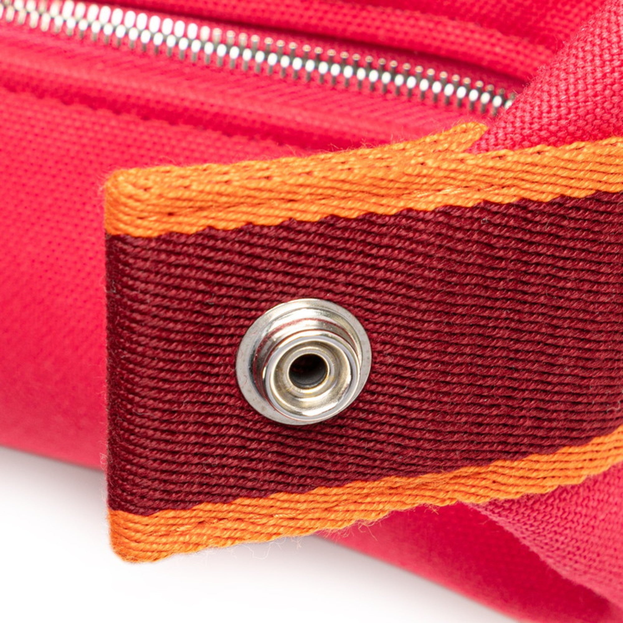 Hermes Hermès Brides A Black PM Handbag in Pink and Orange Canvas for Women