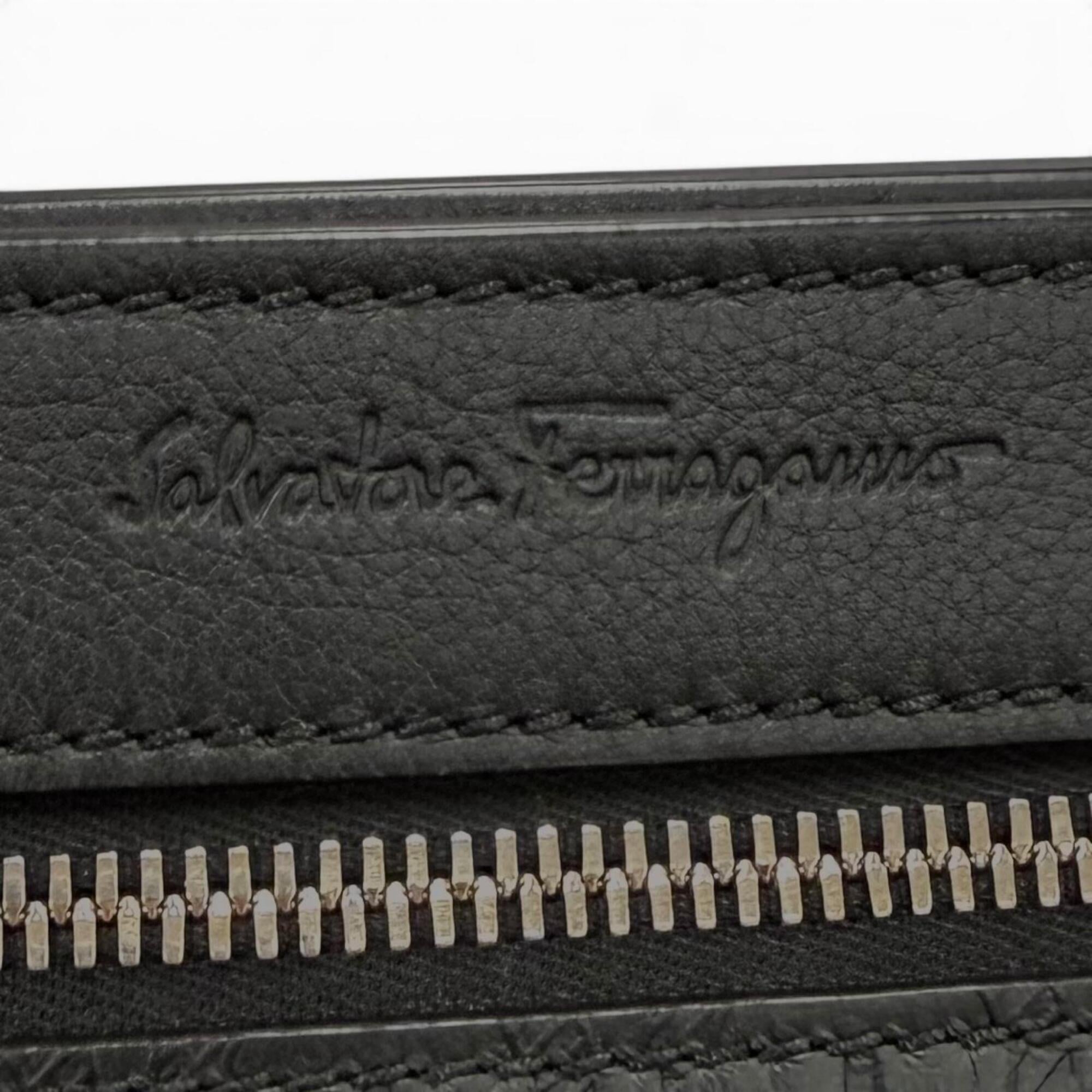 Salvatore Ferragamo leather clutch bag, black, made in Italy, men's, with box and dust bag — Like New
