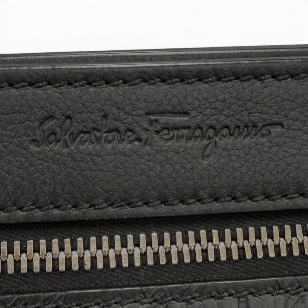 Salvatore Ferragamo leather clutch bag, black, made in Italy, men's, with box and dust bag — Like New