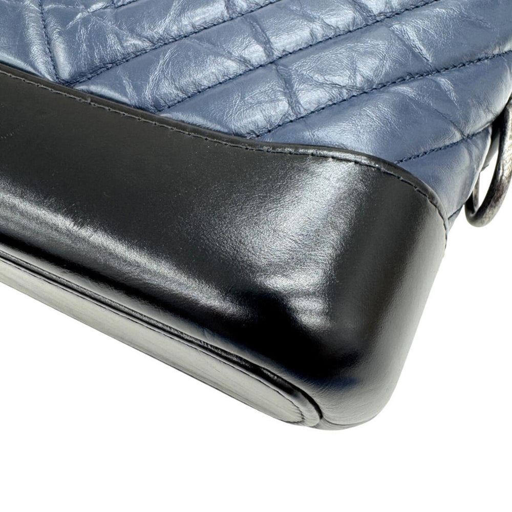 CHANEL Gabrielle de Small Hobo V-stitch Chevron Calfskin Shoulder Bag for Women (Navy/Black) — New - Store Return