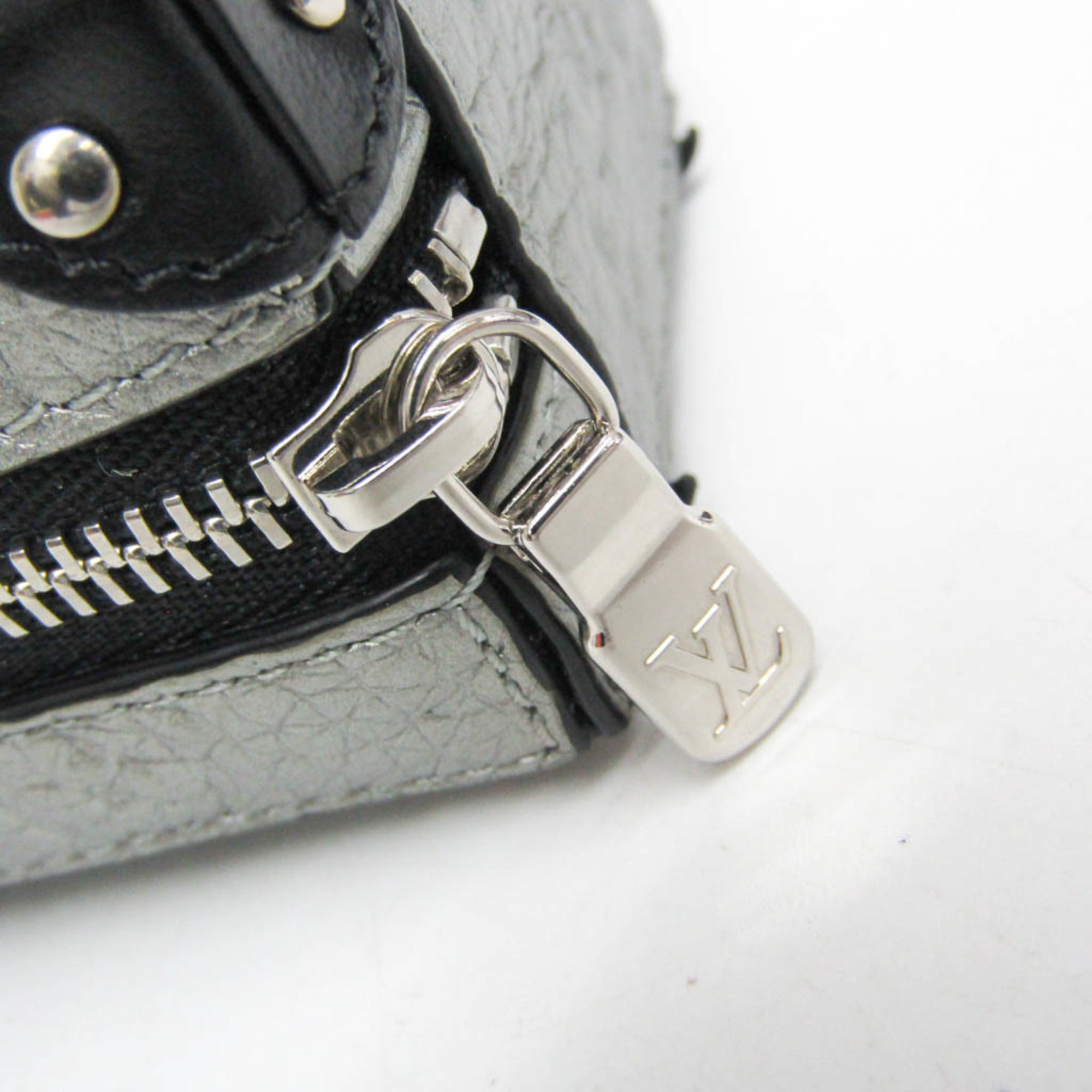 Louis Vuitton Leather Handbag Charm Silver,Black Pochette Soft Trunk Backpack M01392 — Like New