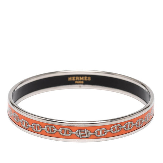 Hermes enamel Chaine d'Ancre motif bangle in silver and orange metal for women.