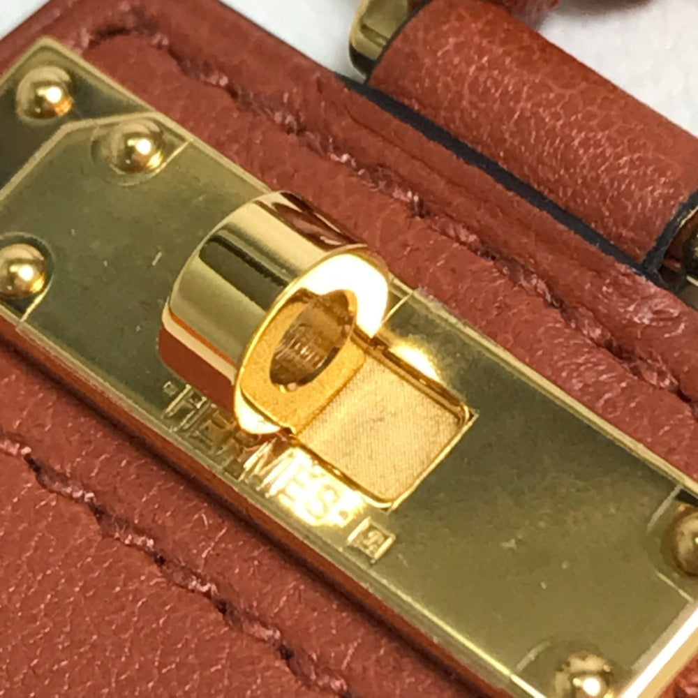 HERMES Mon Petit Kelly PM Necklace Leather Women's Brown — New - Store Return