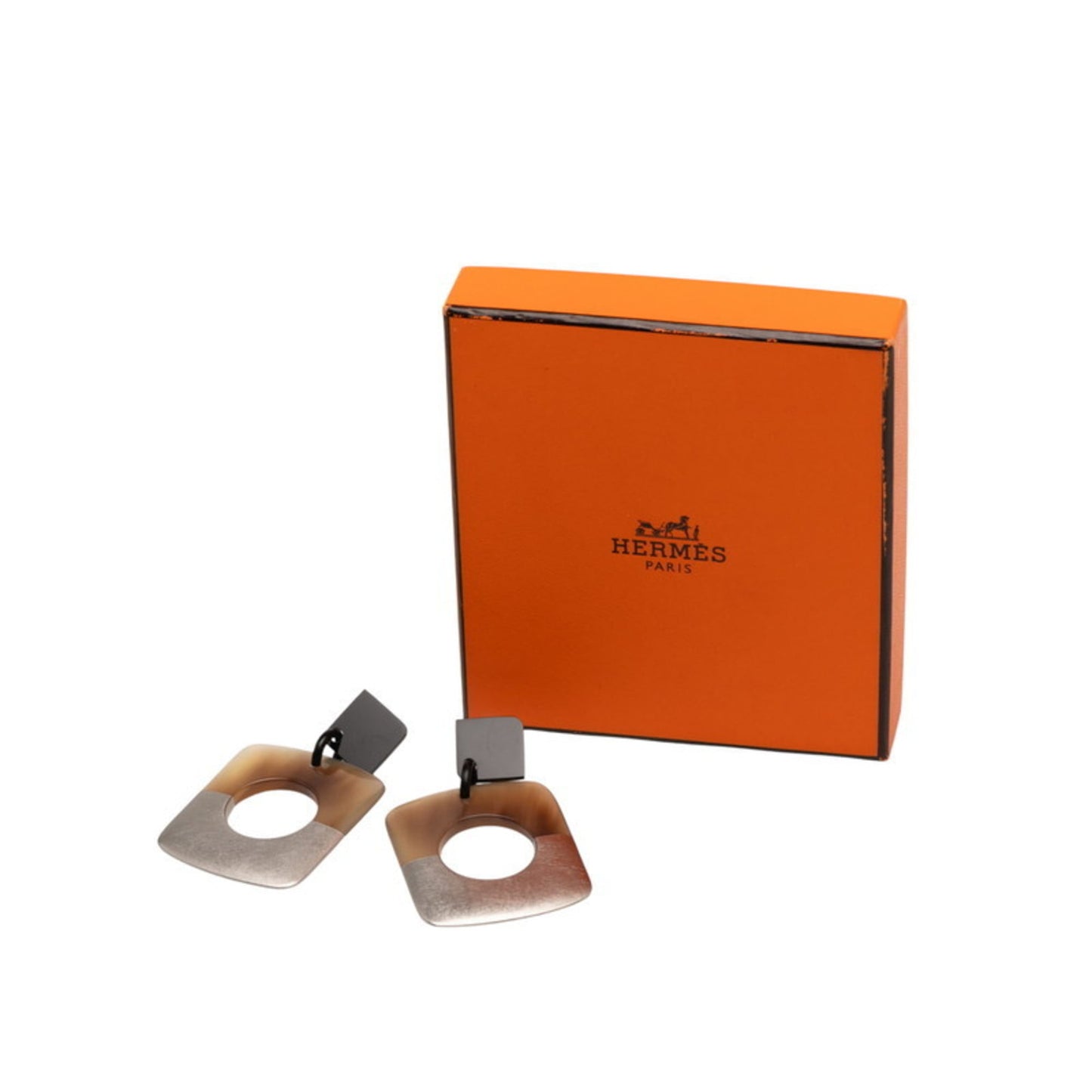 Hermes Hermès Serie Dalva stud earrings in silver, brown, black, and buffalo horn for women.